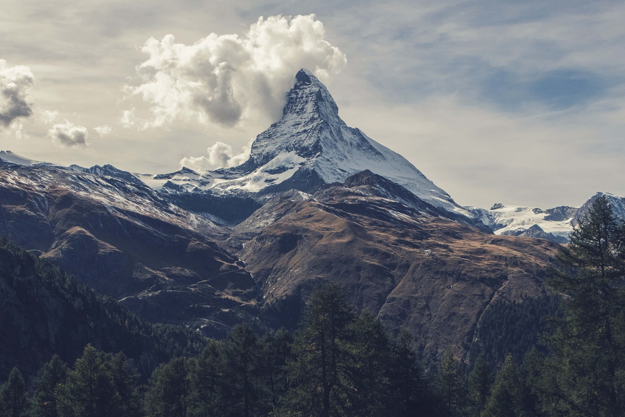 Matterhorn, snow-capped mountain peak, cloudy sky, 2K Desktop Wallpaper