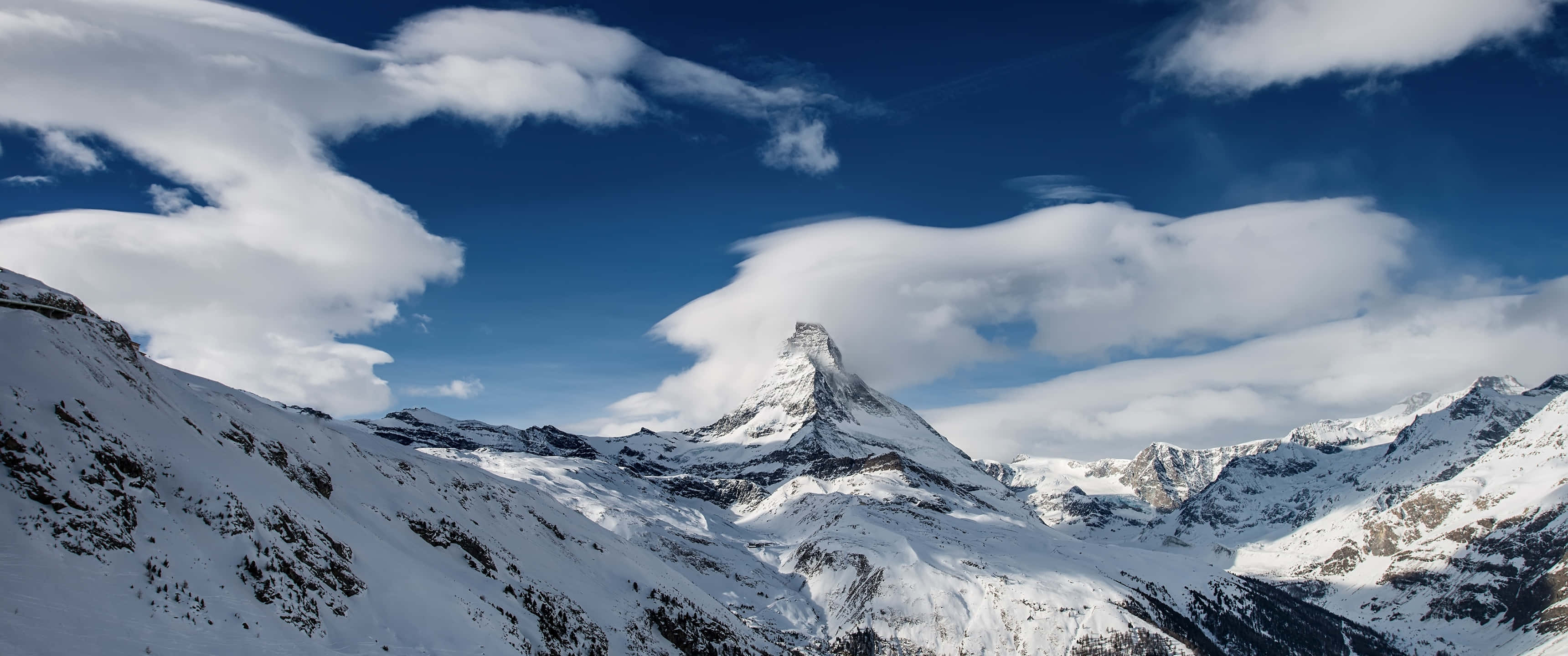 Matterhorn, snowcapped, vibrant blue sky, 2K Desktop Wallpaper