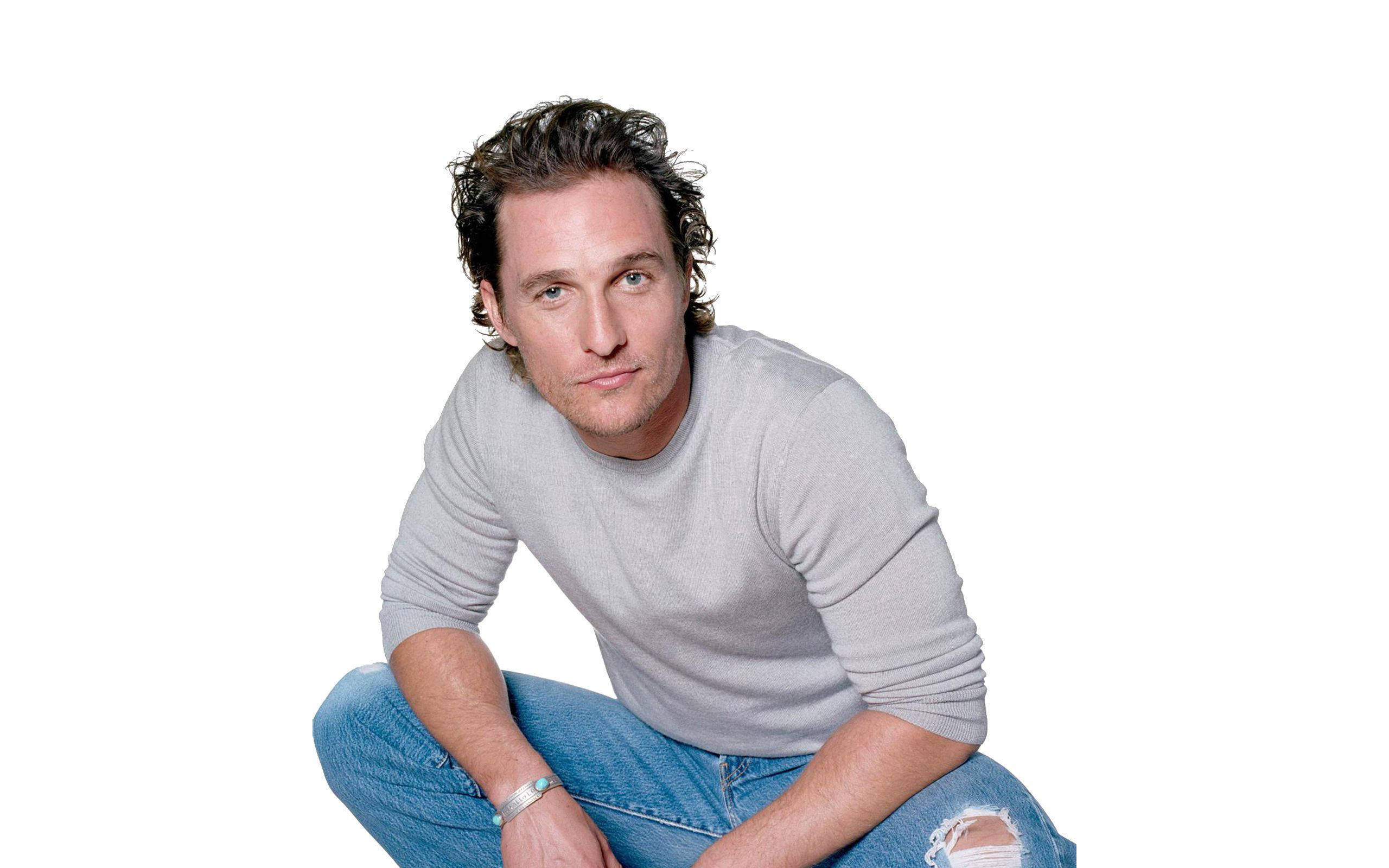 Matthew Mcconaughey, tousled dark hair, ripped jeans, 2K Desktop Wallpaper