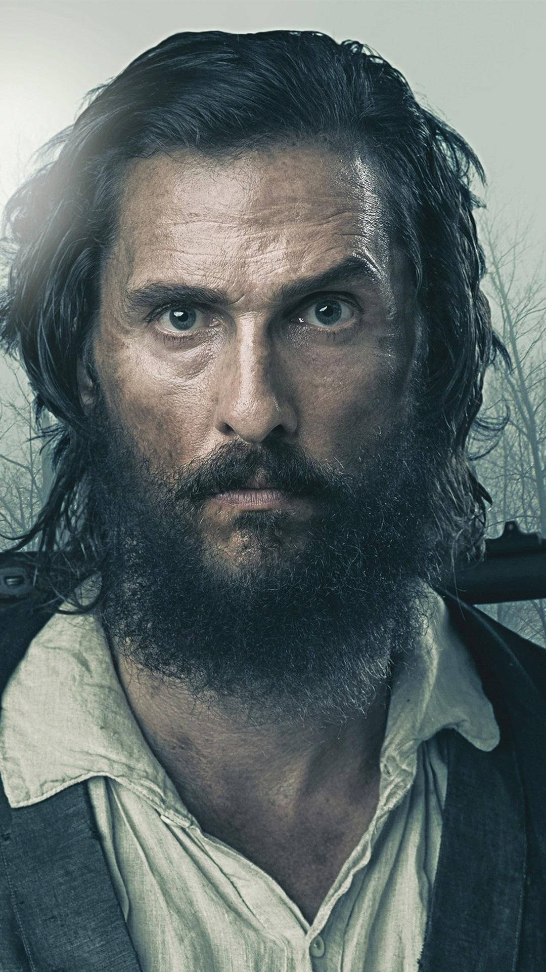 rugged looking matthew mcconaughey, intense eyes, misty forest backdrop, Full HD Phone Wallpaper