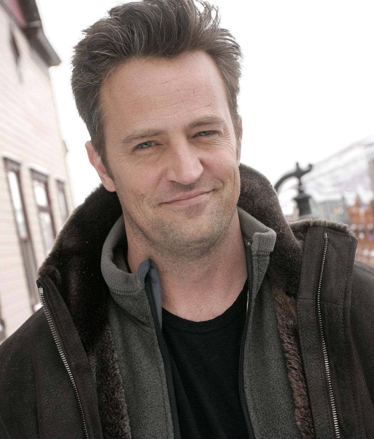 Matthew Perry, dark fleece-lined jacket, snowy urban backdrop, HD Phone Wallpaper