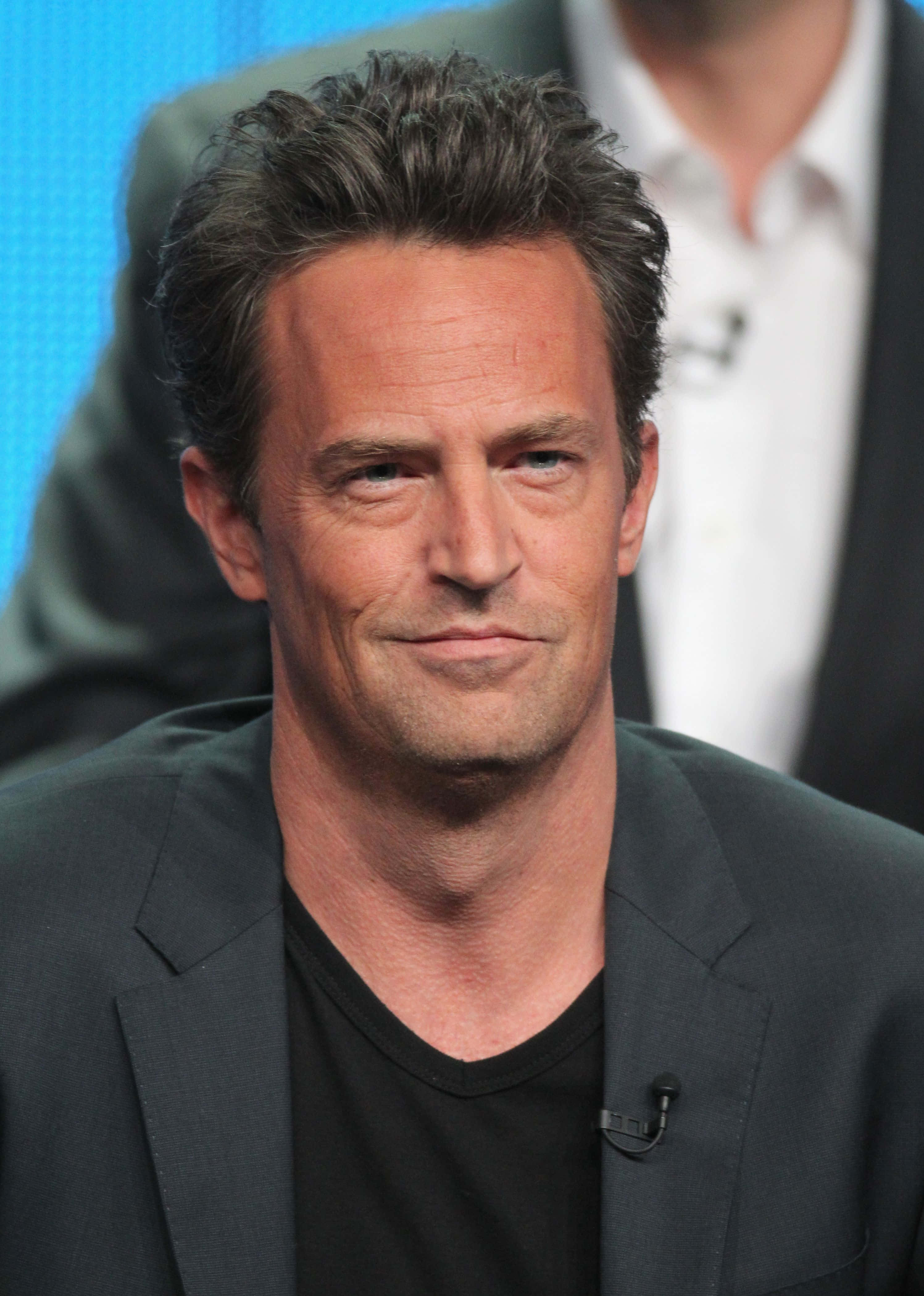 Matthew Perry, black t-shirt, dark blazer, 4K Phone Wallpaper
