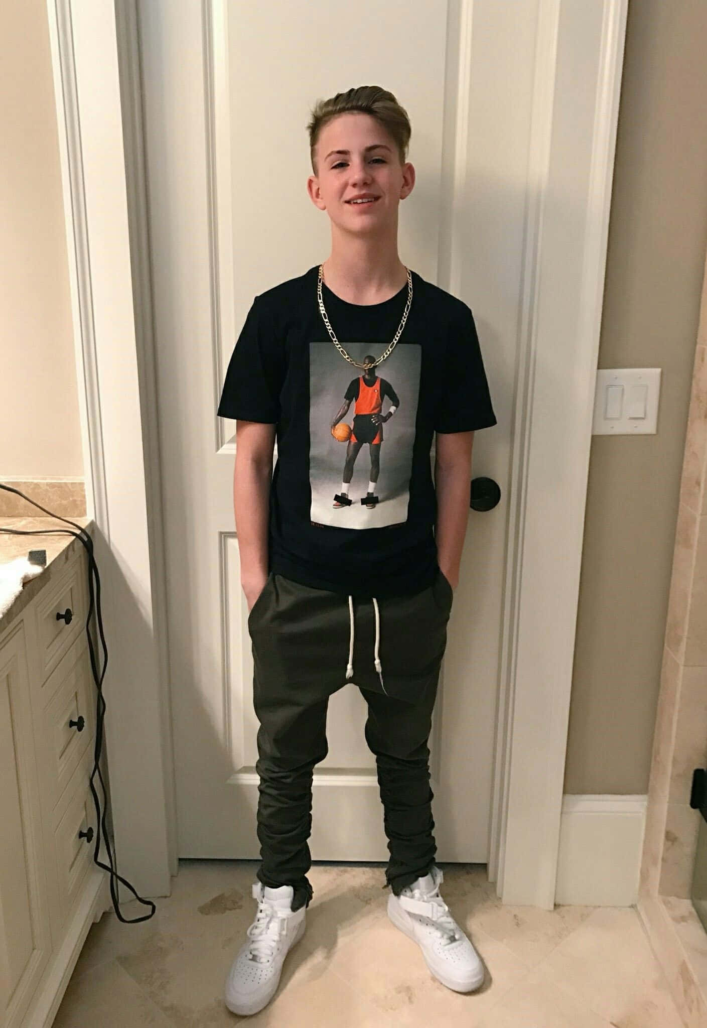 Matty B, black graphic tee, olive joggers, Full HD Phone Wallpaper