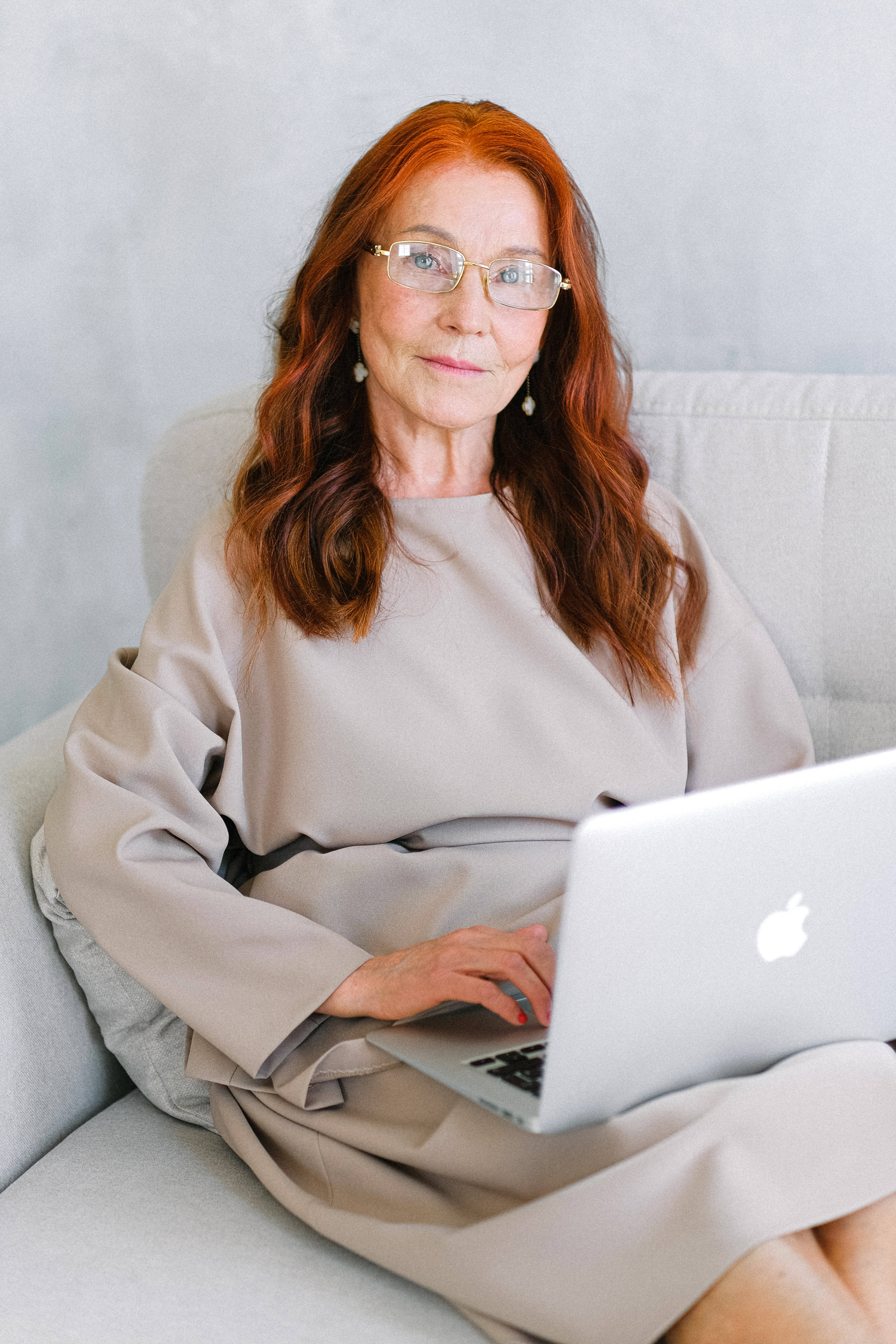 red hair, glasses, light gray couch, 5K Phone Wallpaper
