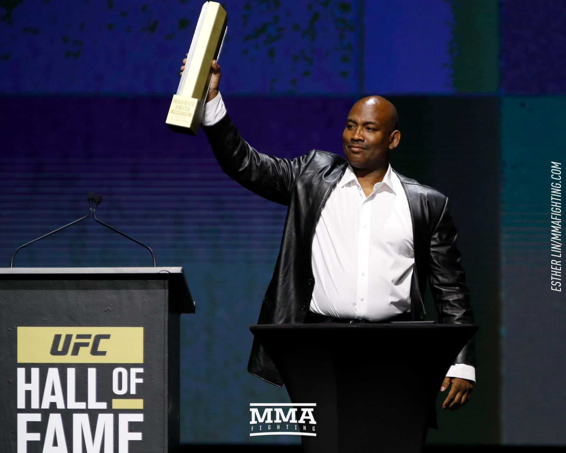 Maurice Smith, black leather jacket, gold UFC Hall of Fame trophy, Full HD Desktop Wallpaper