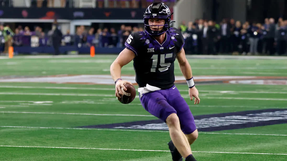 Max Duggan, purple and black uniform, green field, SD Desktop Wallpaper