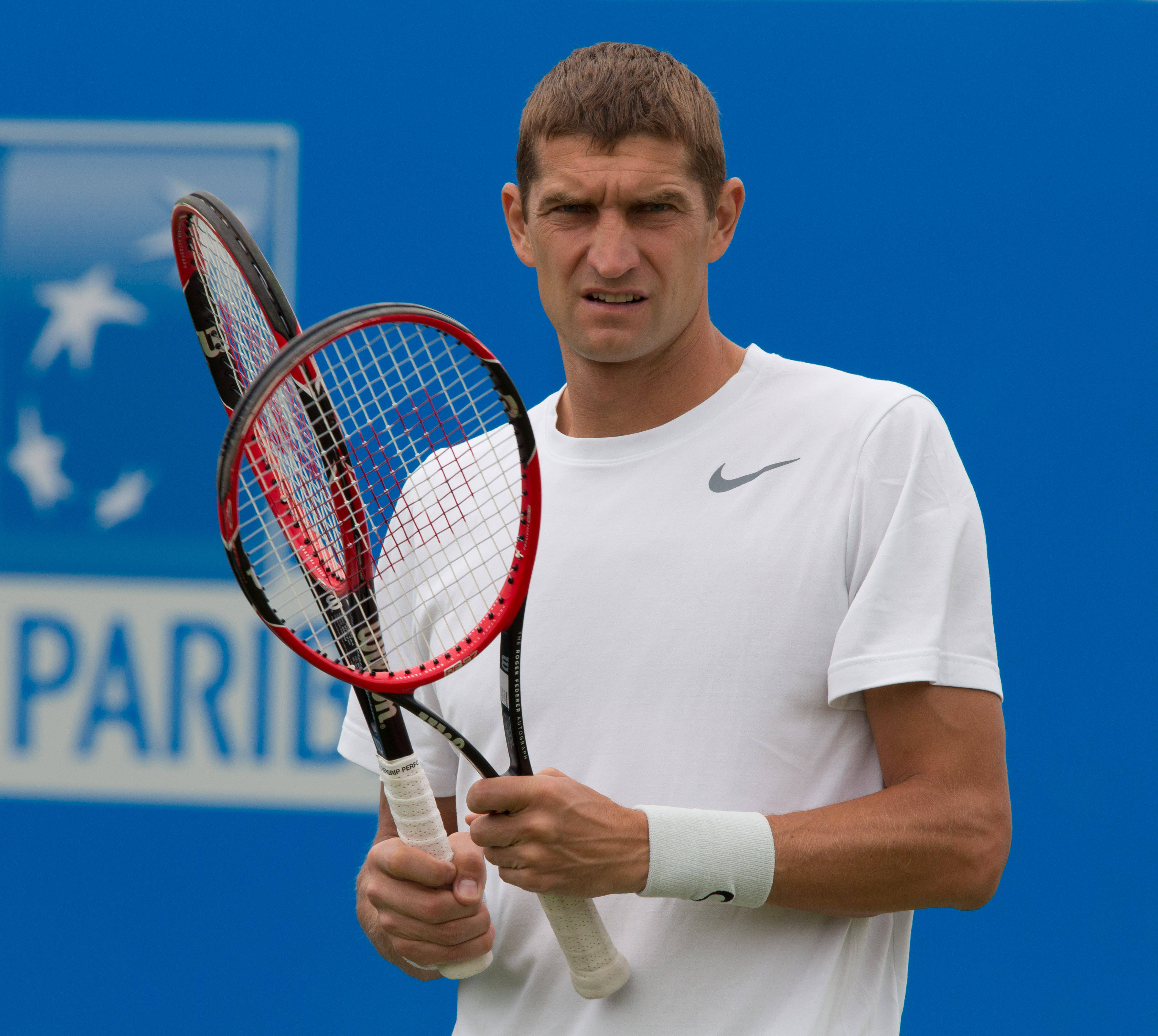 Max Mirnyi, two rackets, blue Paris backdrop, 4K Desktop Wallpaper