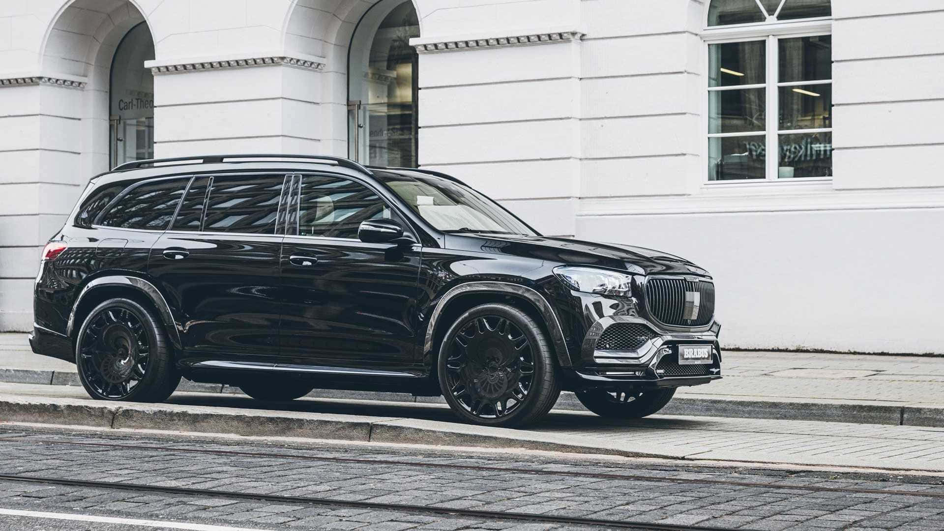 Maybach GLS 600, sleek black luxury SUV, cobblestone street, Full HD Desktop Wallpaper