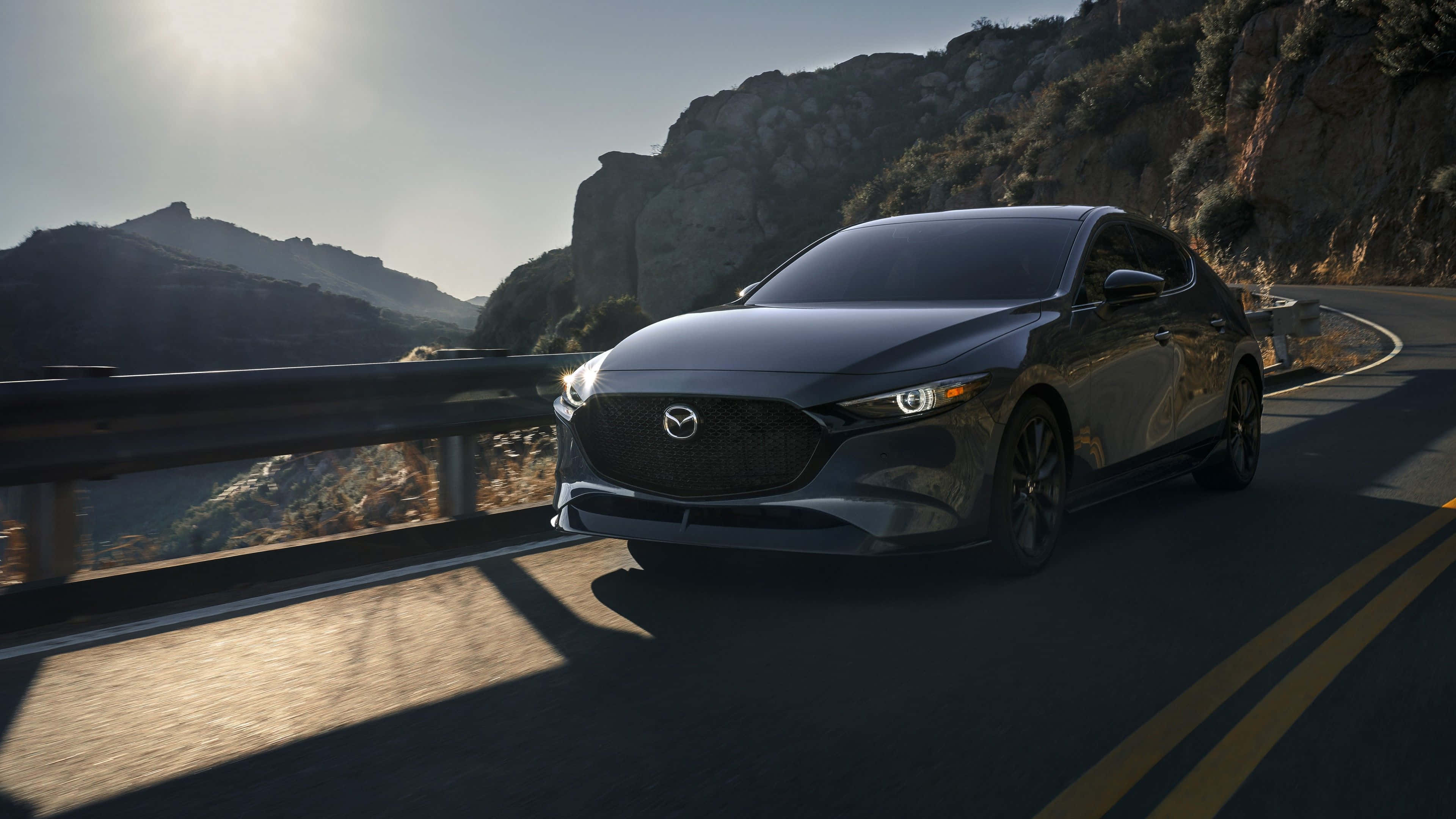 Mazda 3 Hatchback, dark gray, winding mountain road, 4K Desktop Wallpaper