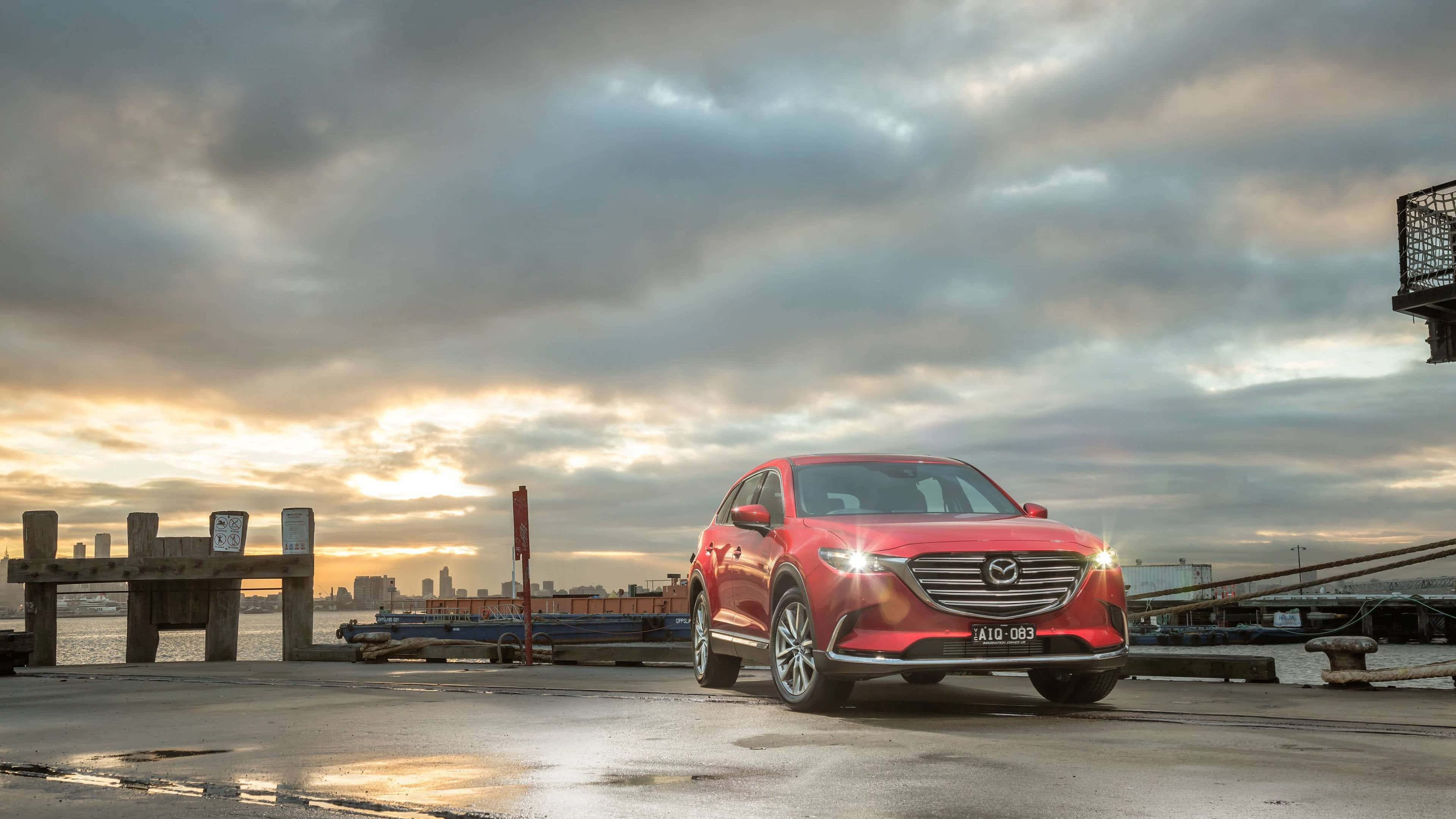 Mazda CX-9, glossy red, dramatic sunset sky, 4K Desktop Wallpaper