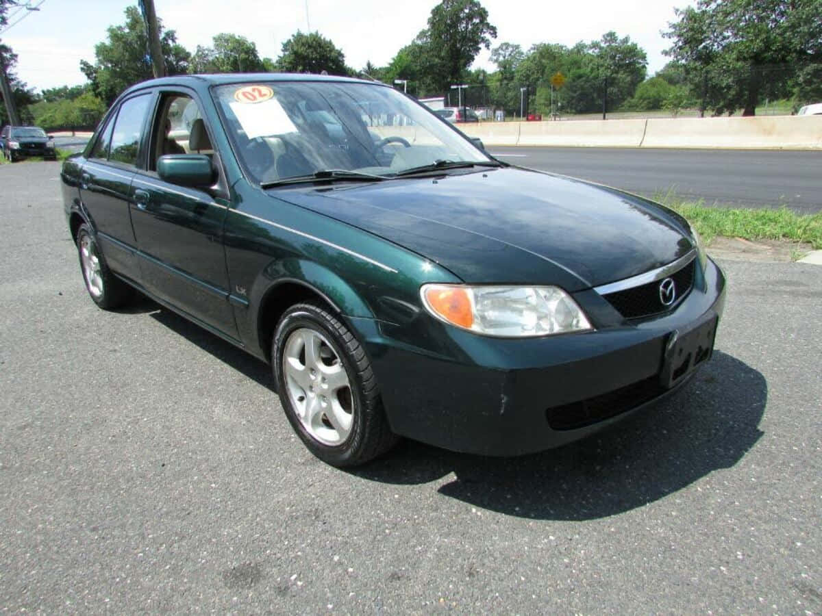 Mazda Protege, dark green, asphalt, SD Desktop Wallpaper