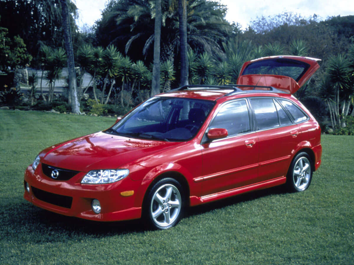 Mazda Protege, Night Cityscape, vibrant red, SD Desktop Wallpaper