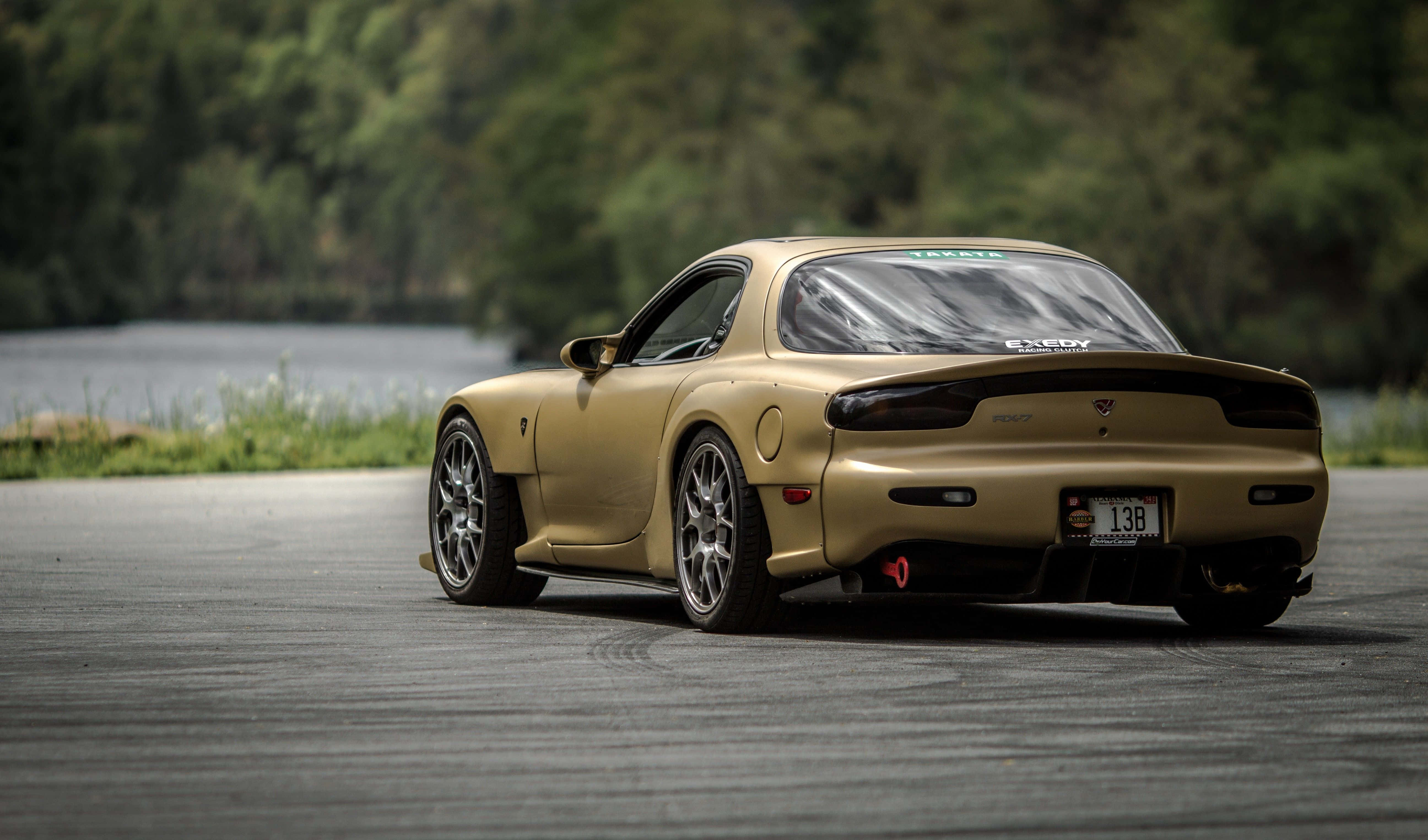 Mazda RX-7, desaturated yellow, paved road, 5K Desktop Wallpaper