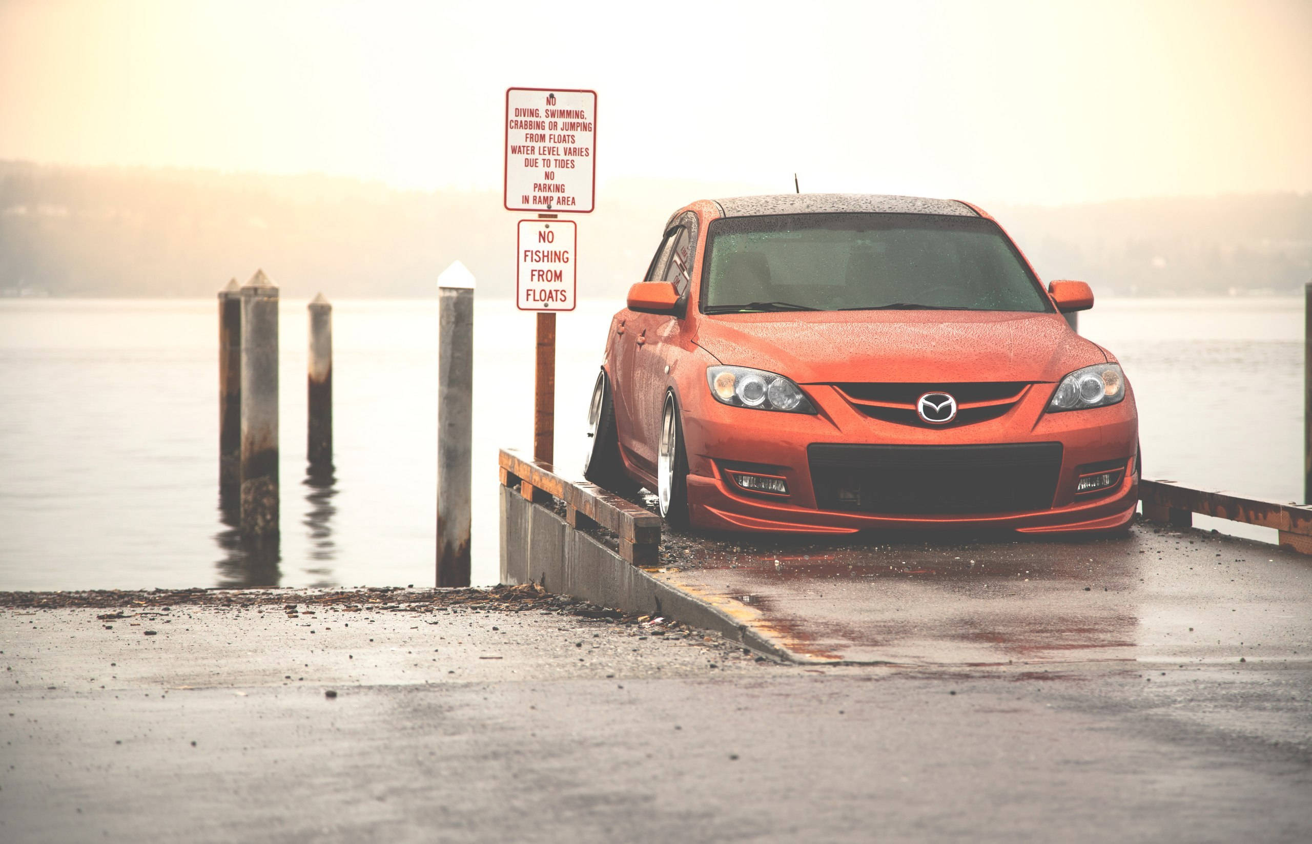 orange Mazda 3, pier, wet dock, 2K Desktop Wallpaper