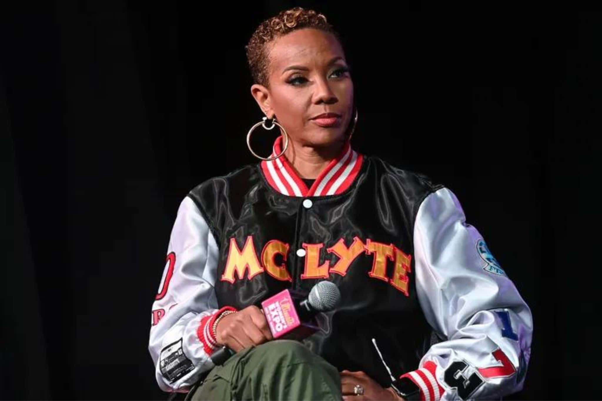Mc Lyte, black and white varsity jacket, bold orange letters, Full HD Desktop Wallpaper