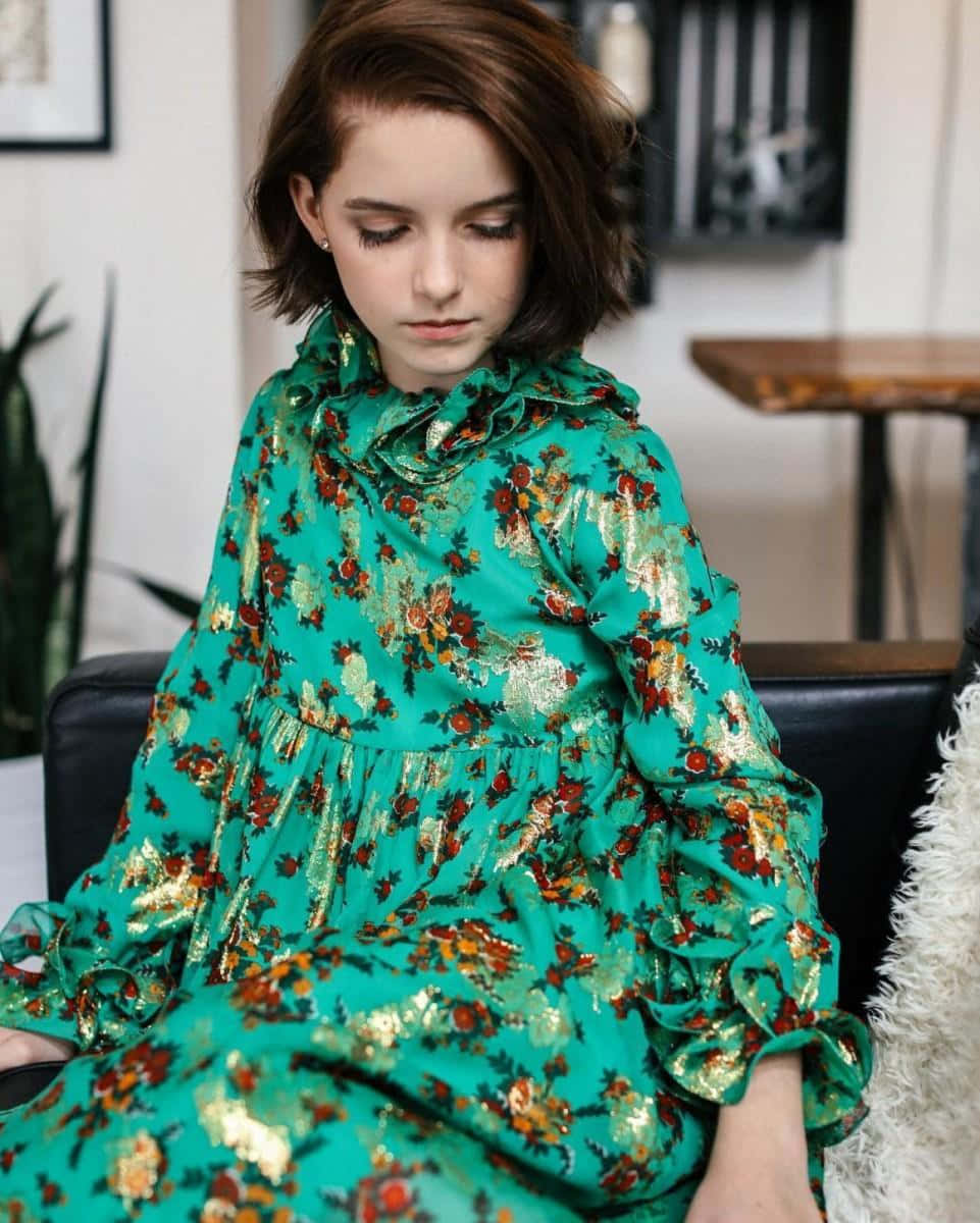 Mckenna Grace, vibrant green floral dress, gold accents, SD Phone Wallpaper