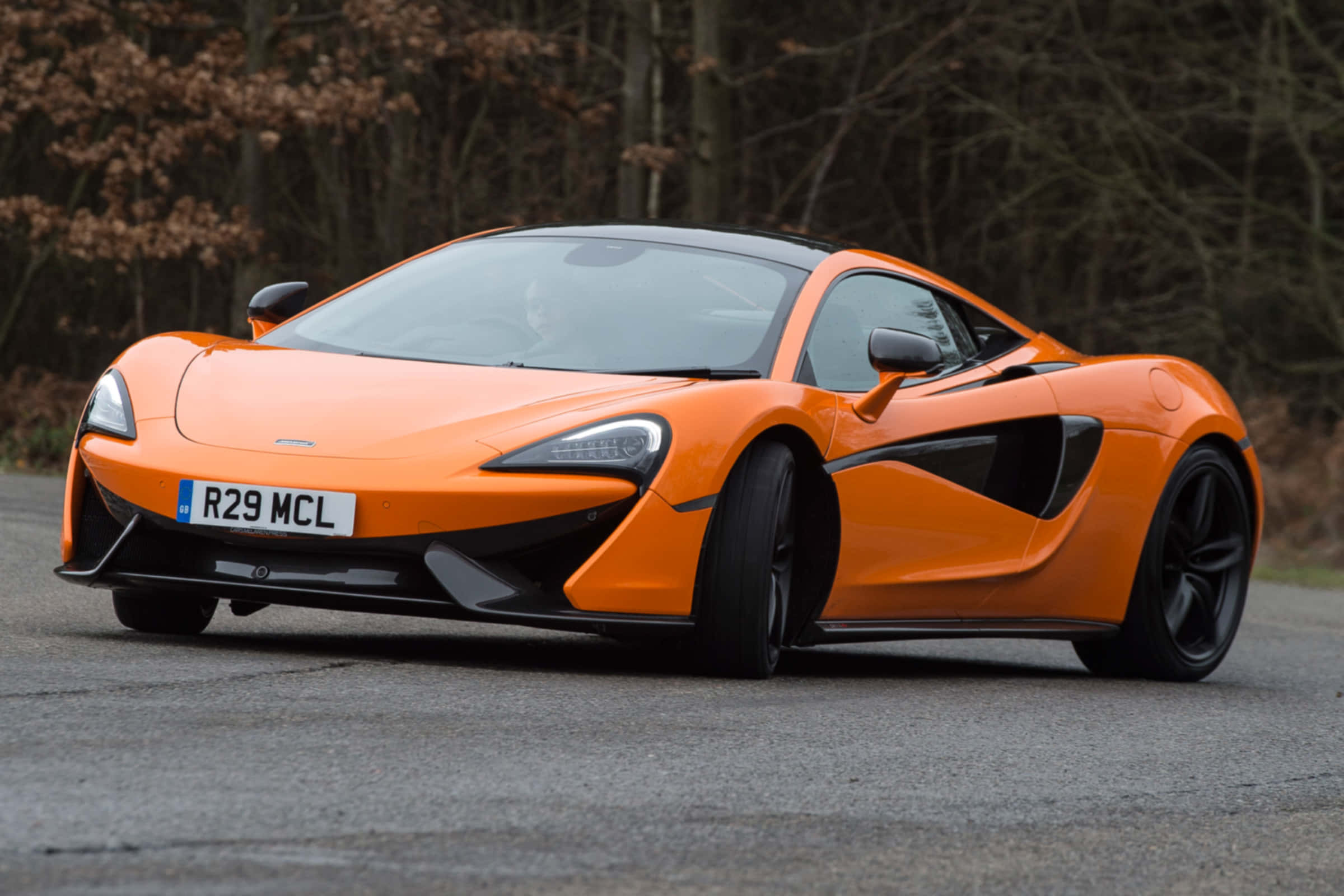 McLaren 570S, vibrant orange, paved road, Full HD Desktop Wallpaper