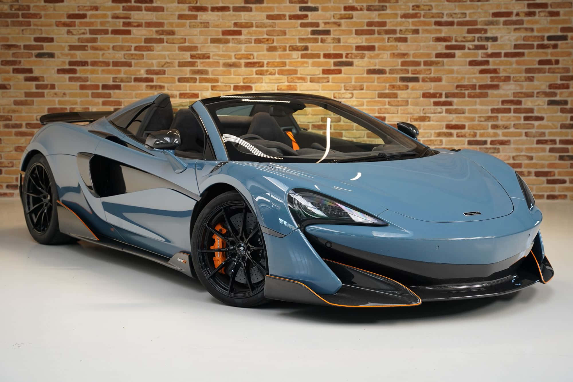 McLaren 600LT Spider, light blue, orange accents, Full HD Desktop Wallpaper