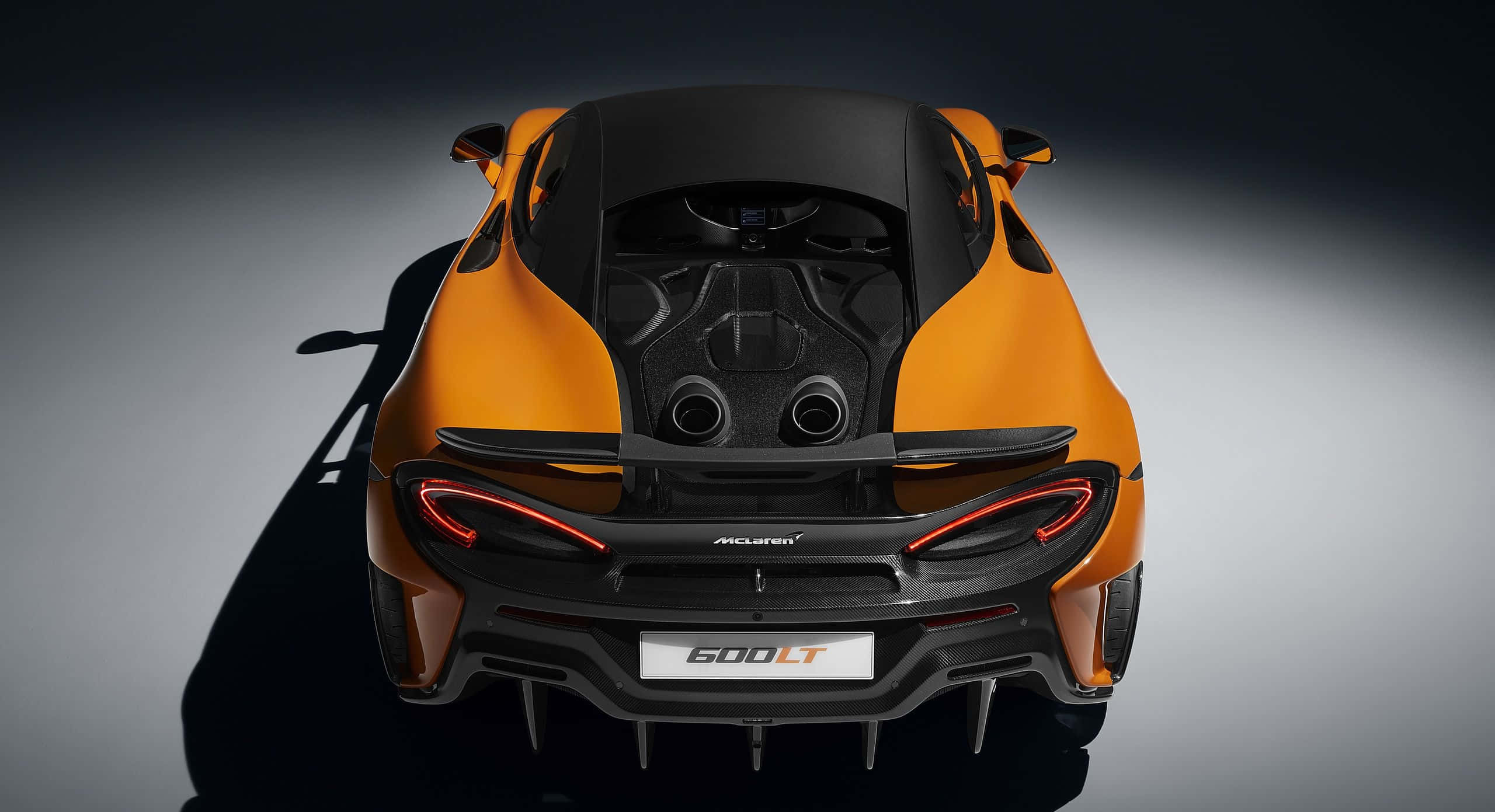 McLaren 600LT, vibrant orange, exposed engine, 2K Desktop Wallpaper