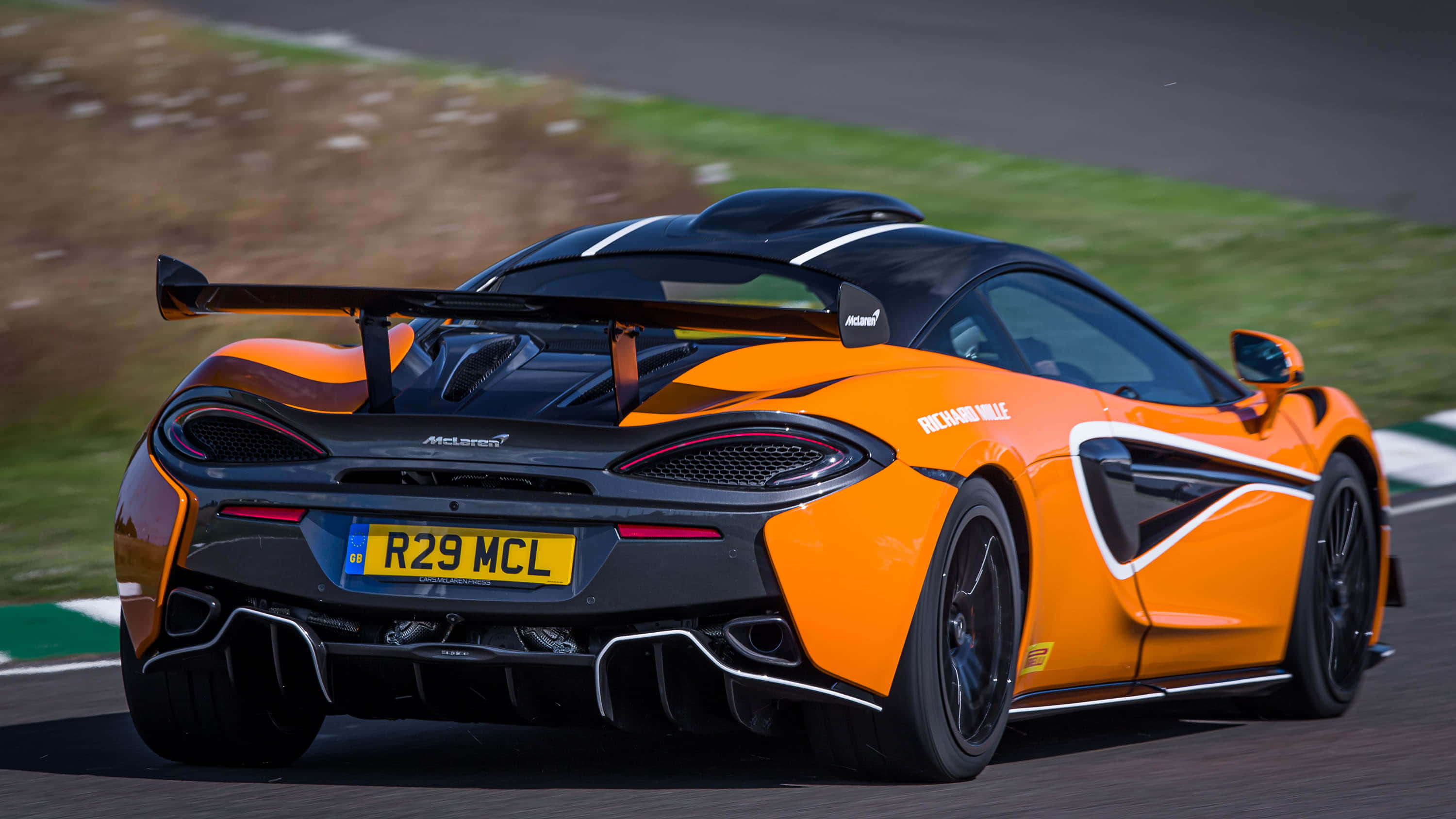 McLaren 620R, vibrant orange, black accents, 2K Desktop Wallpaper