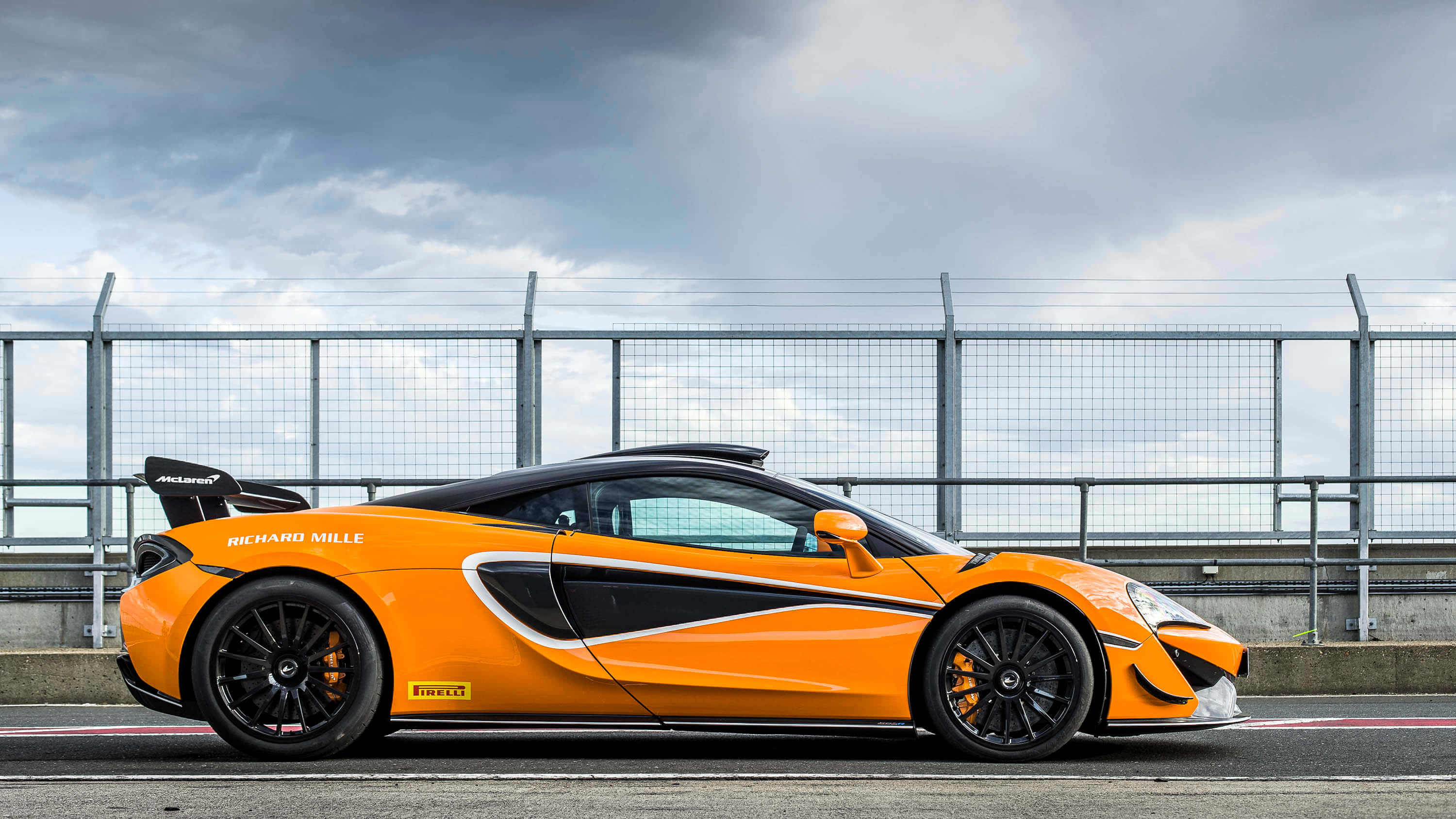 McLaren 620R, vibrant orange, black accents, 2K Desktop Wallpaper