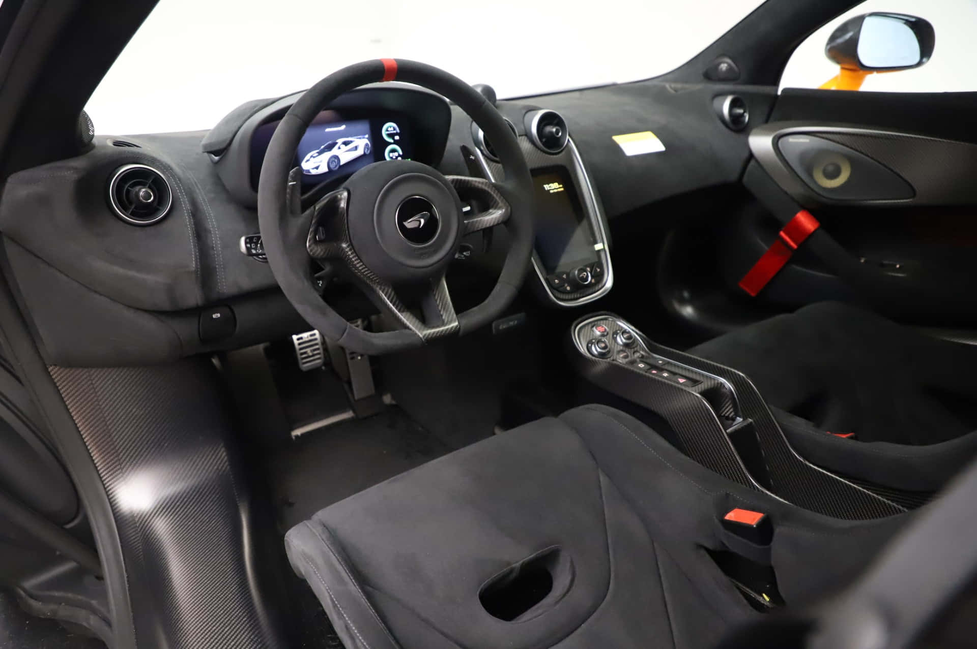 McLaren 620R, black carbon fiber accents, red safety belts, Full HD Desktop Wallpaper