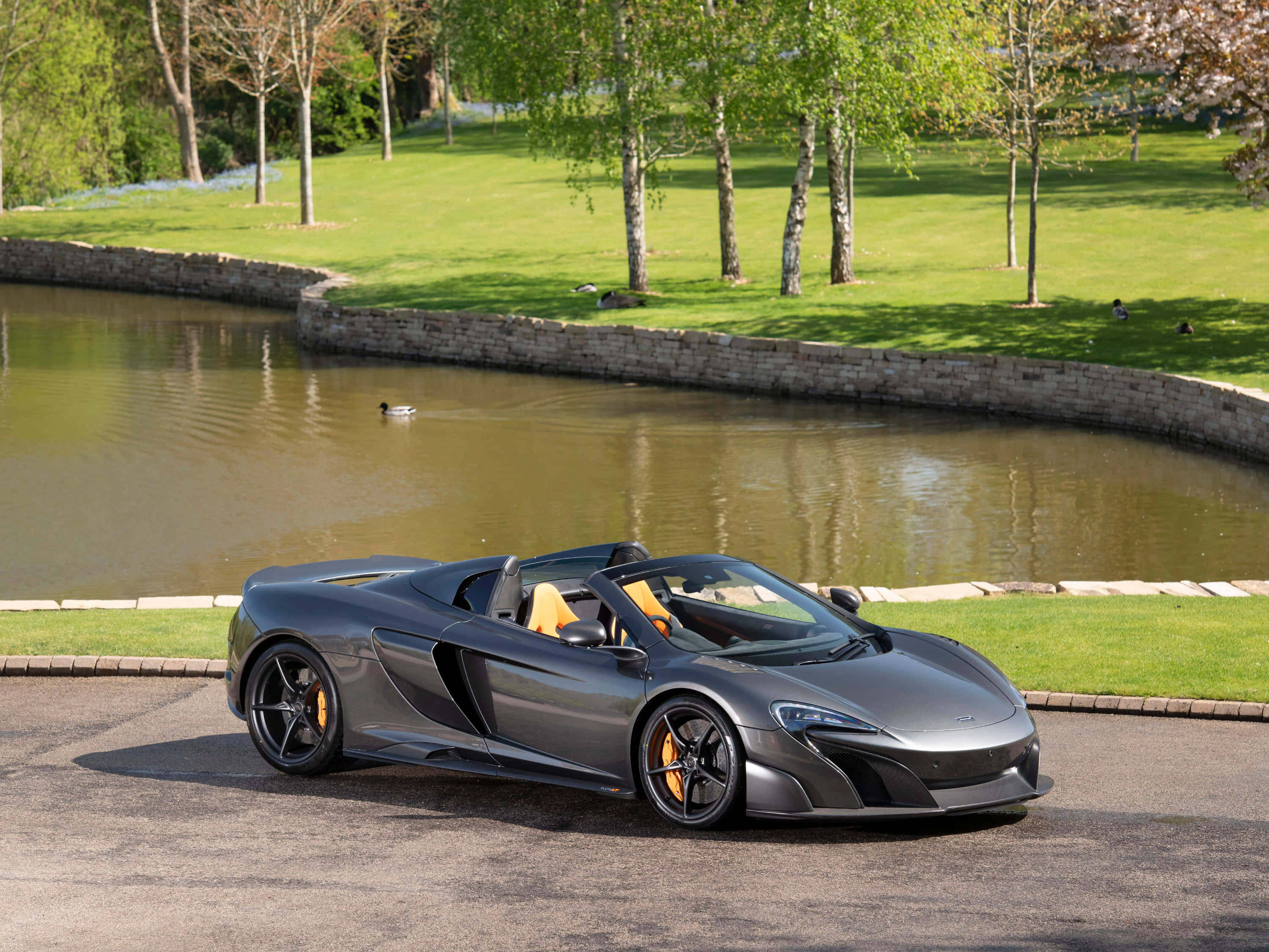 McLaren 675LT Spider, matte gray, orange accents, 2K Desktop Wallpaper