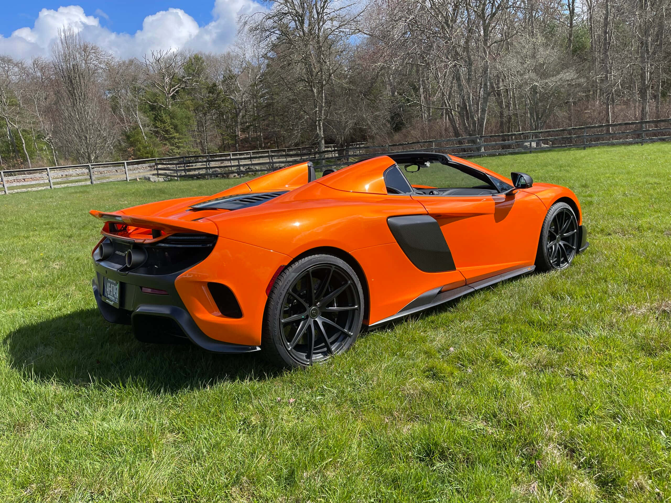 McLaren 675LT Spider, vibrant orange, lush green grass, 2K Desktop Wallpaper