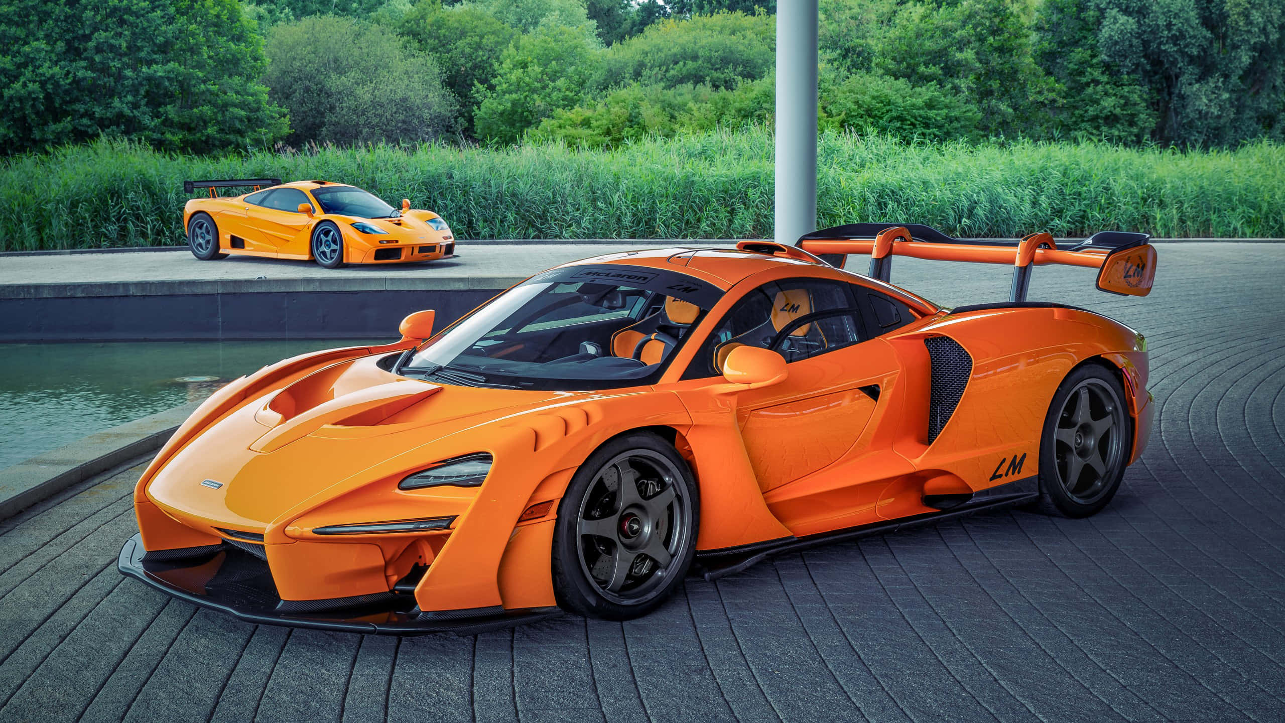 Mclaren F1, vibrant orange, race track, 2K Desktop Wallpaper