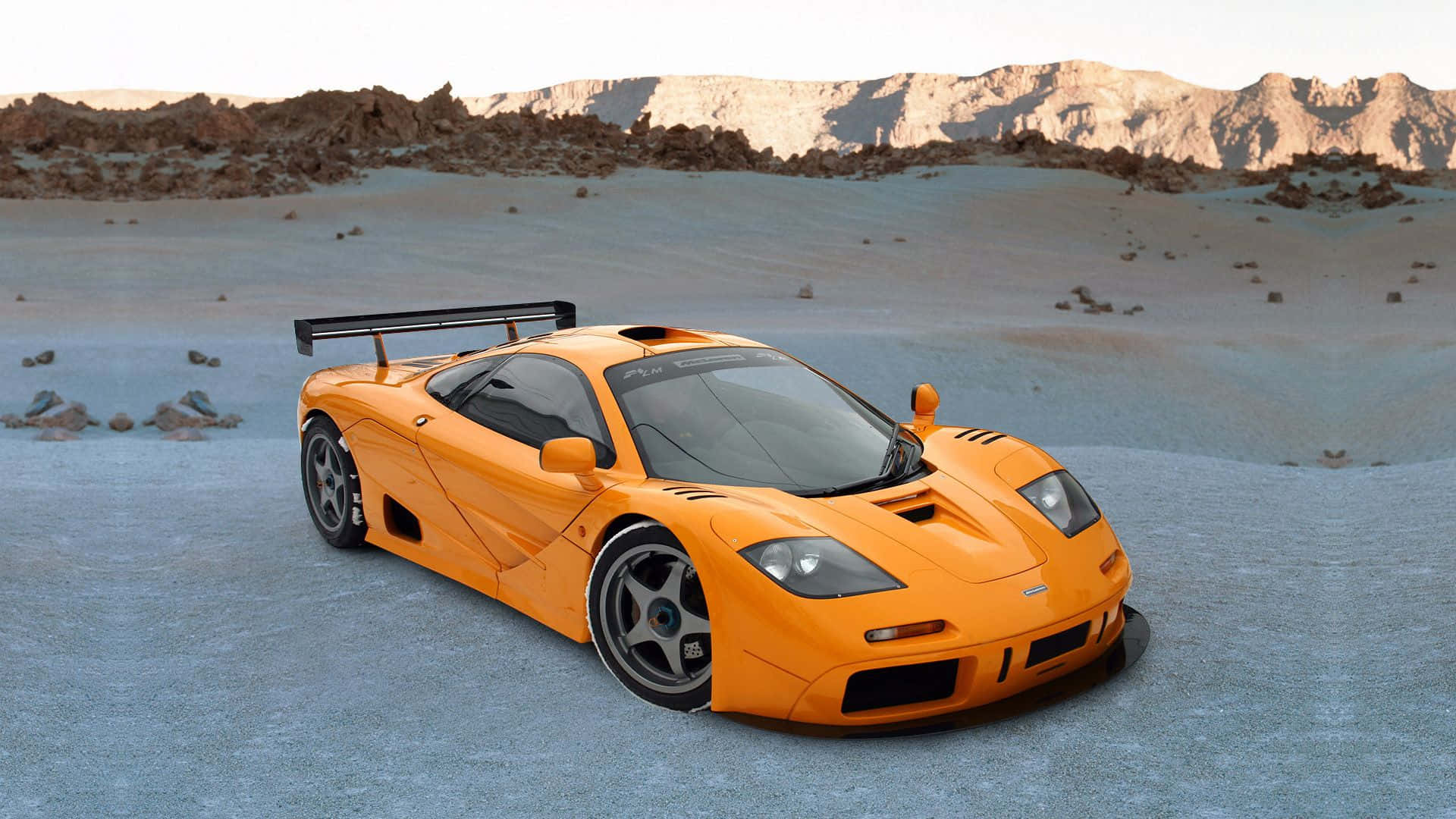 McLaren F1, vibrant orange, desert plain, Full HD Desktop Wallpaper