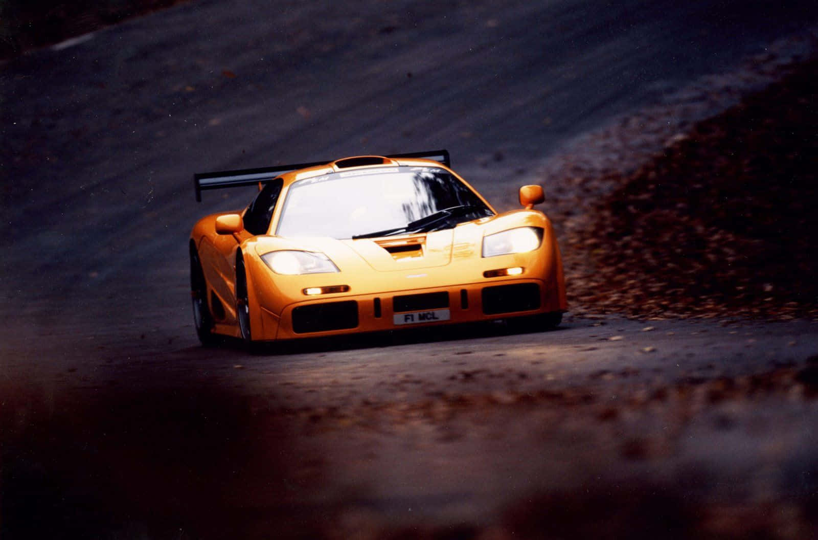 McLaren F1, vibrant orange, dark winding road, HD Desktop Wallpaper