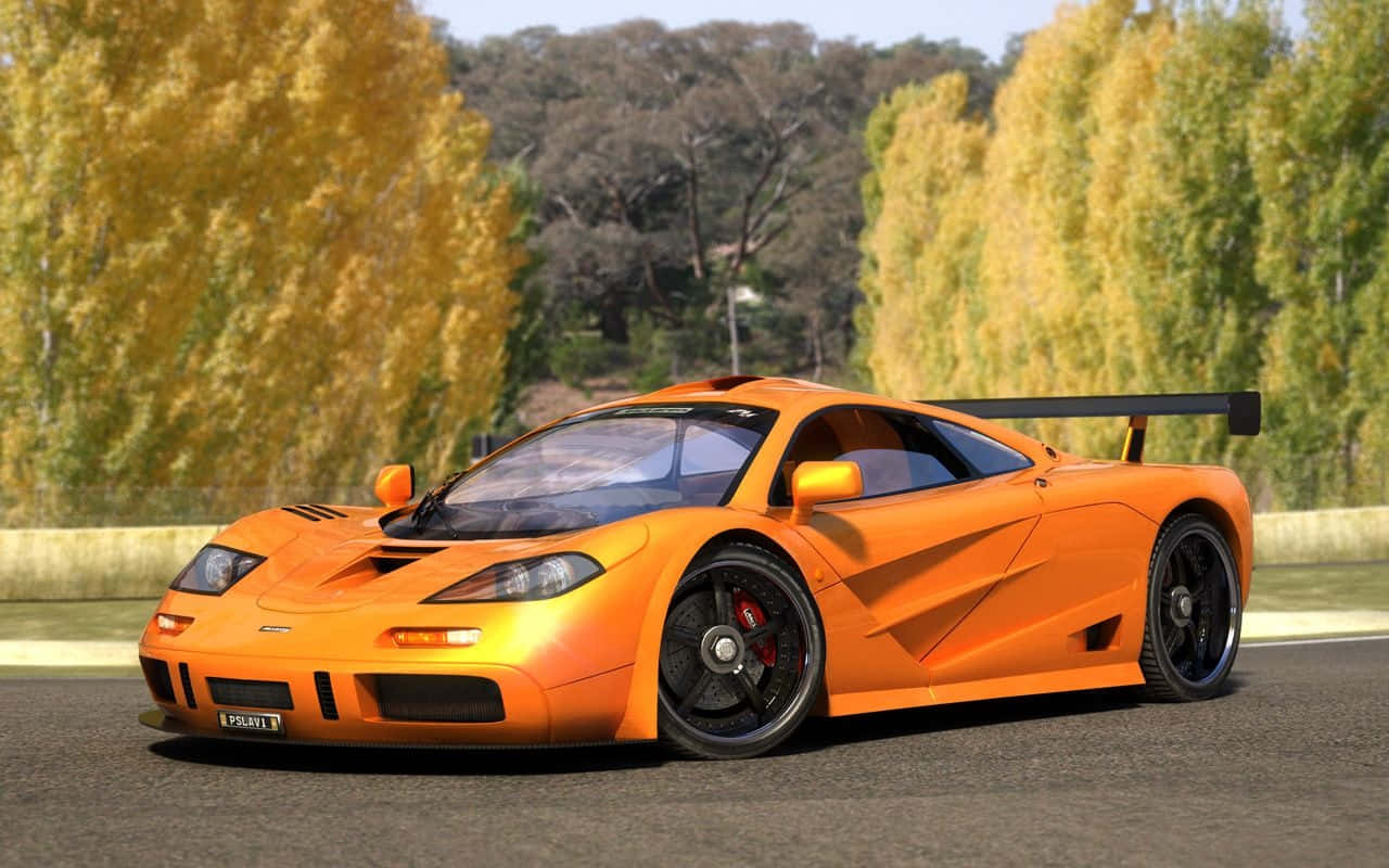 McLaren F1, vibrant orange, golden autumn trees, HD Desktop Wallpaper