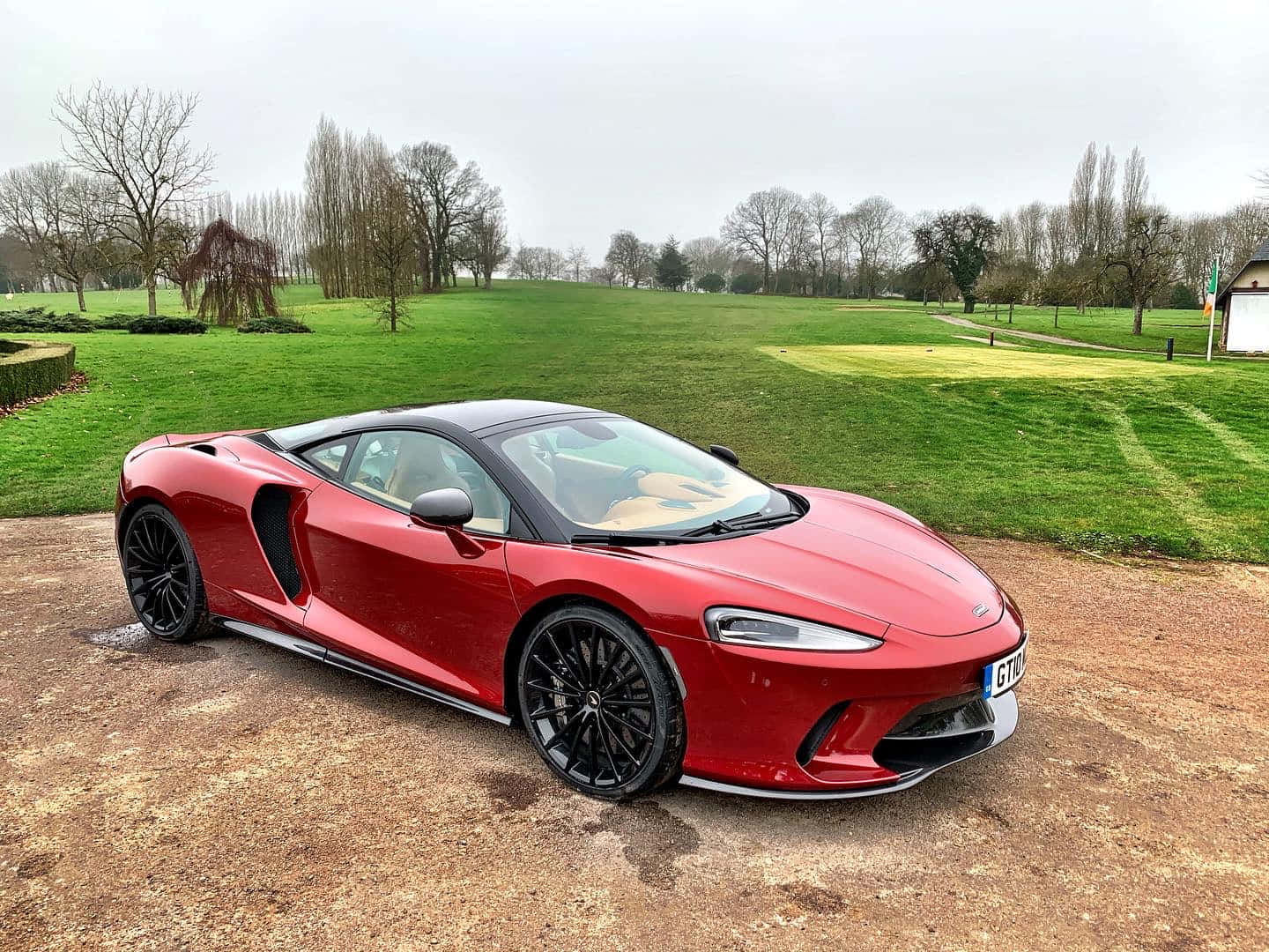 McLaren GT, glossy red, gravel driveway, HD Desktop Wallpaper