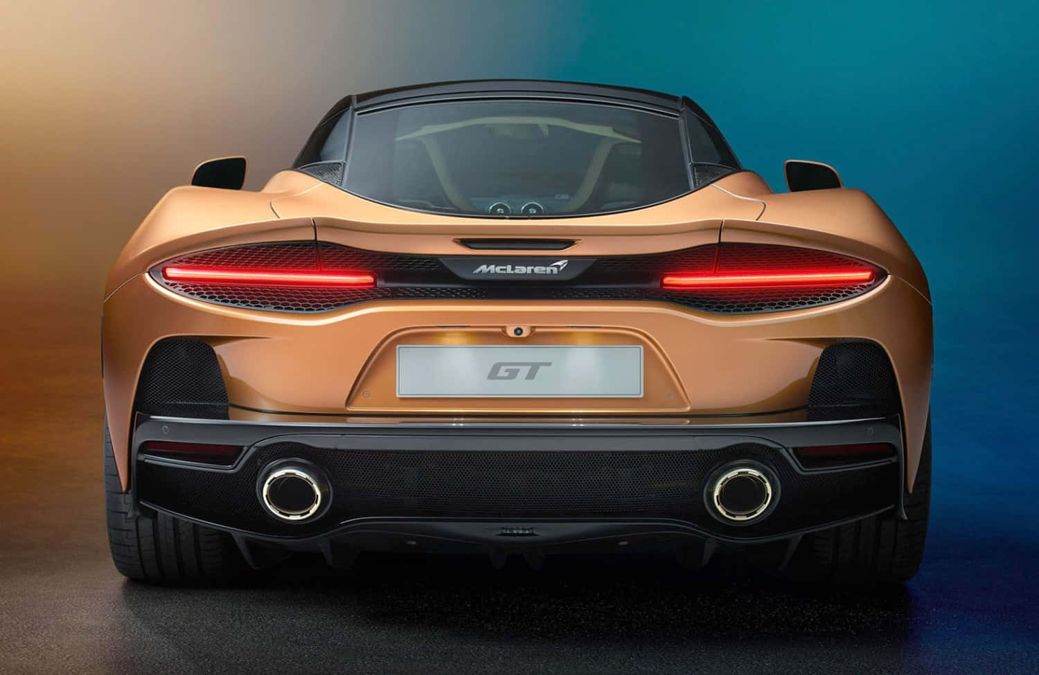 McLaren GT, gold, glowing red taillights, HD Desktop Wallpaper