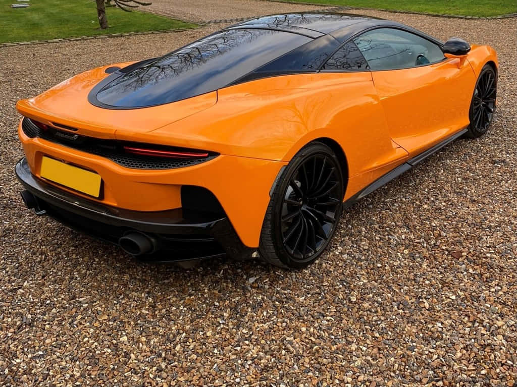McLaren GT, vibrant orange, black accents, SD Desktop Wallpaper