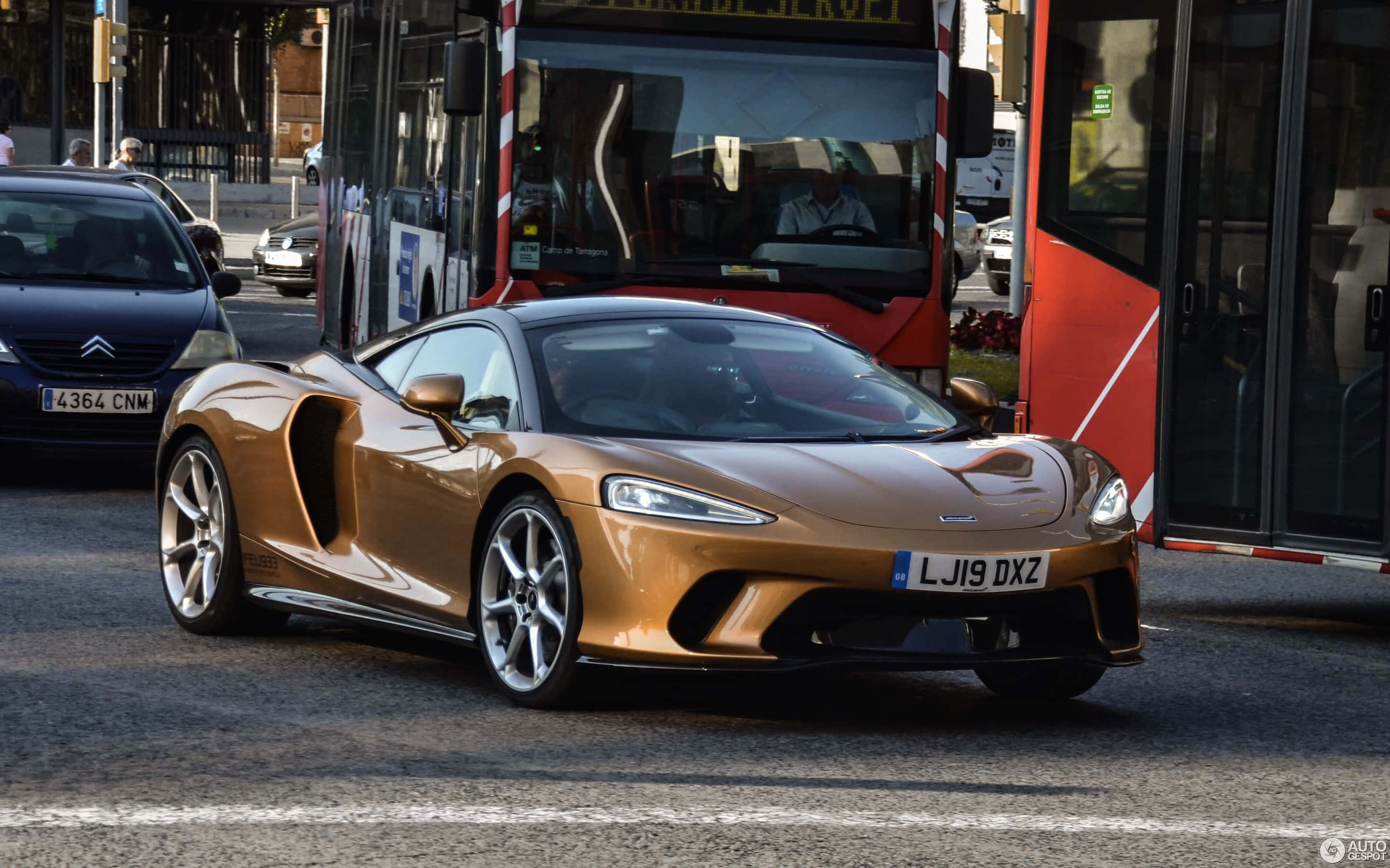 McLaren GT, gold, city street, 2K Desktop Wallpaper
