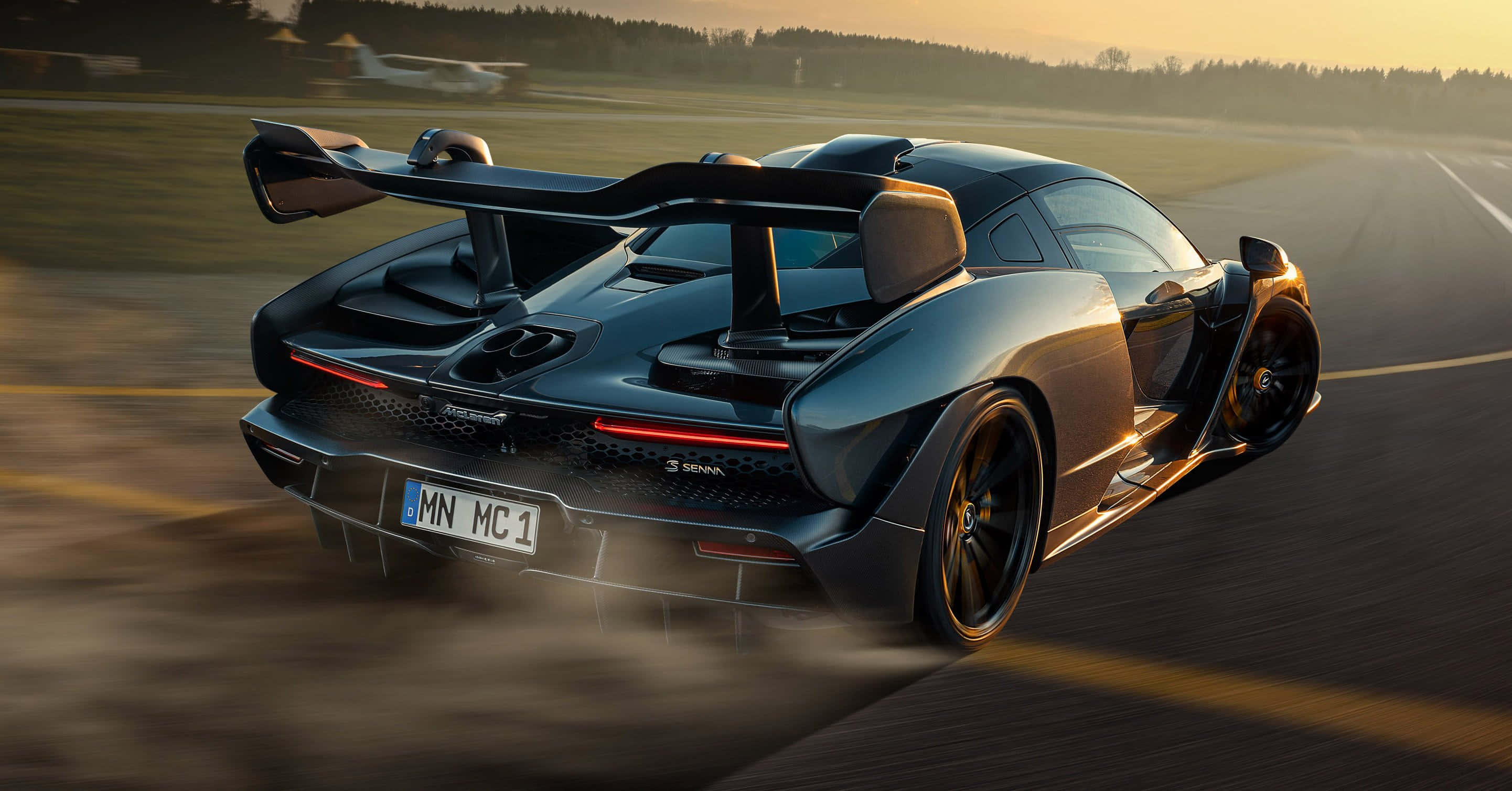 McLaren Senna, sleek black, runway, 2K Desktop Wallpaper