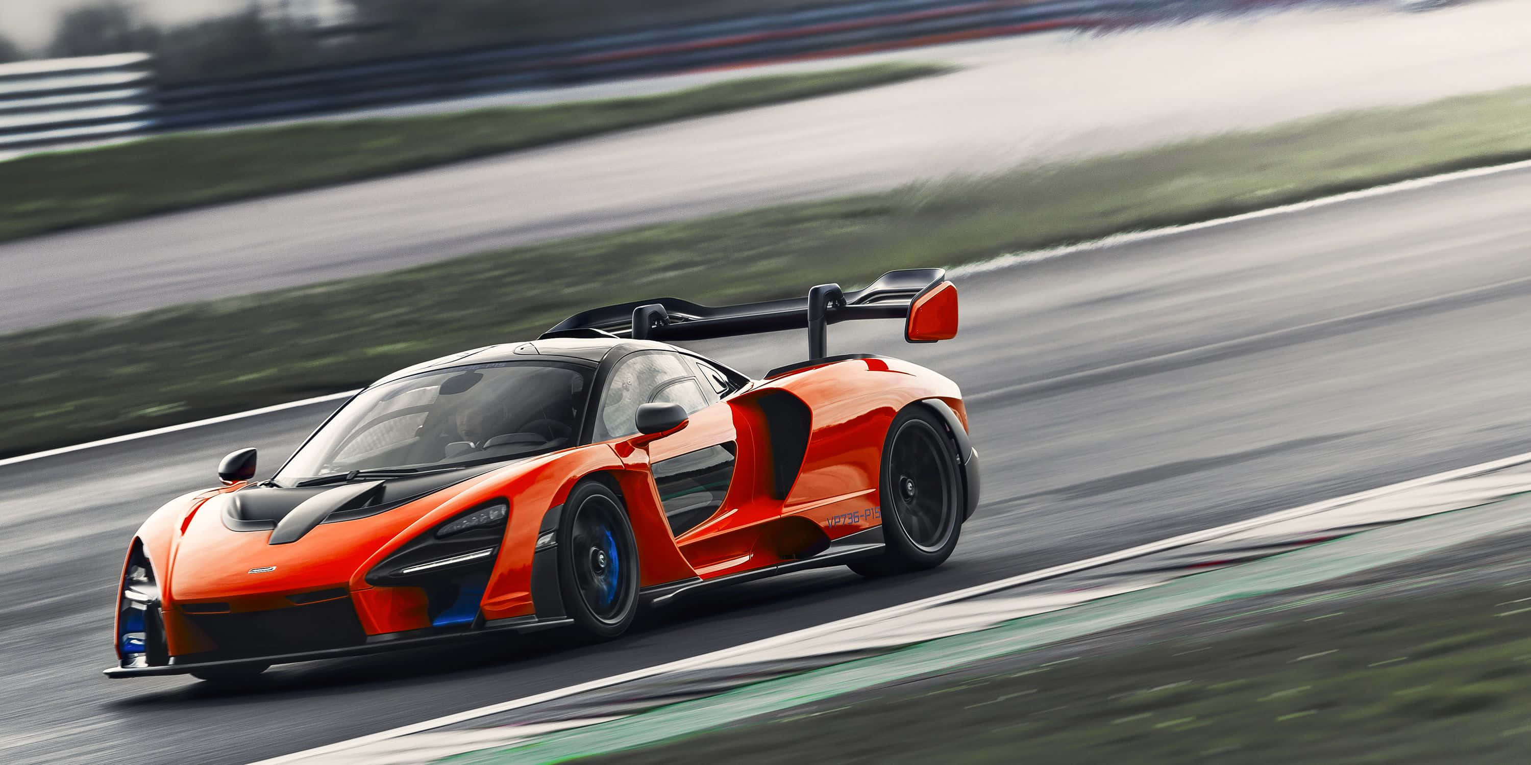 McLaren Senna, vibrant orange, wet track, 2K Desktop Wallpaper