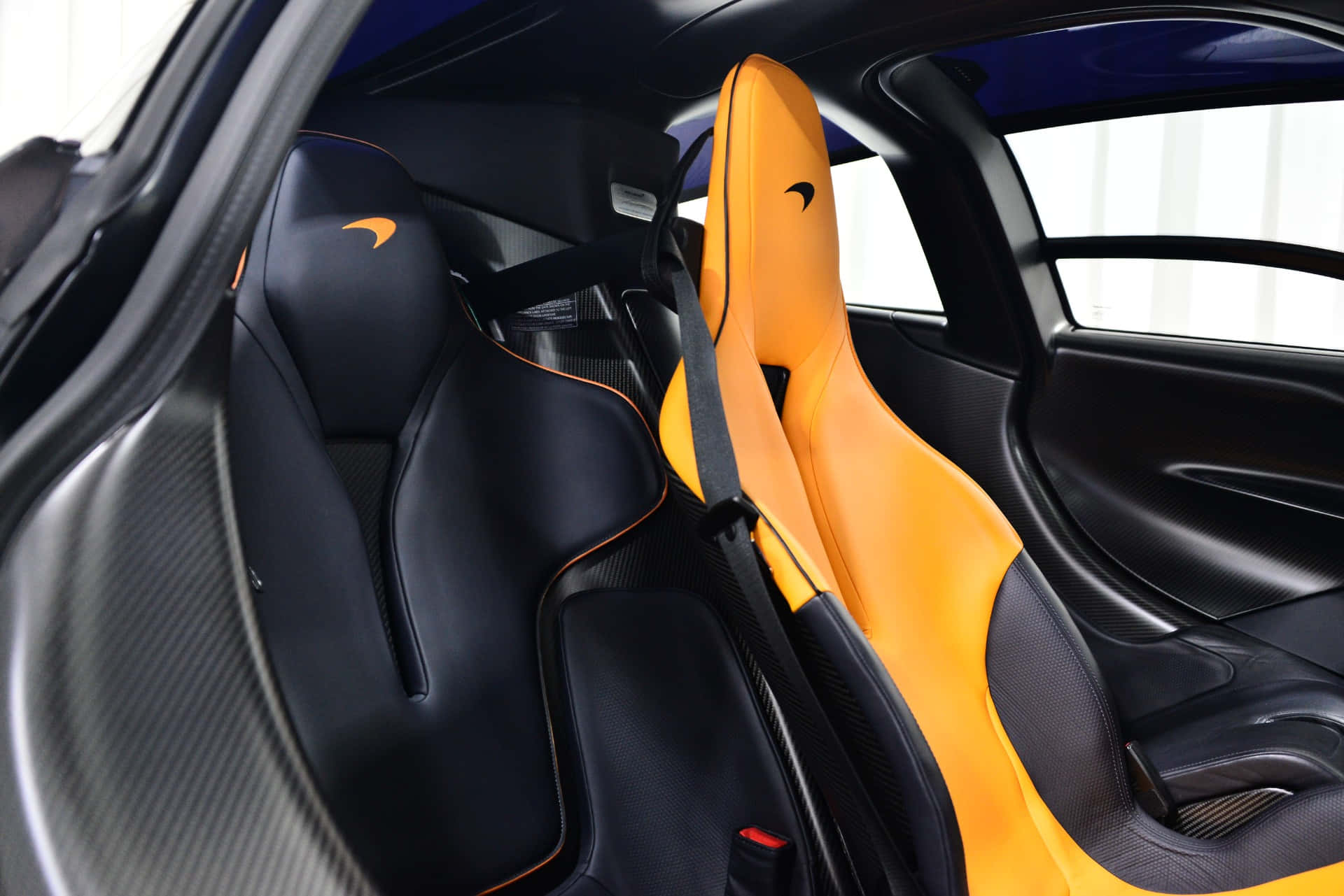 McLaren Speedtail, black and orange racing seats, carbon fiber accents, Full HD Desktop Wallpaper