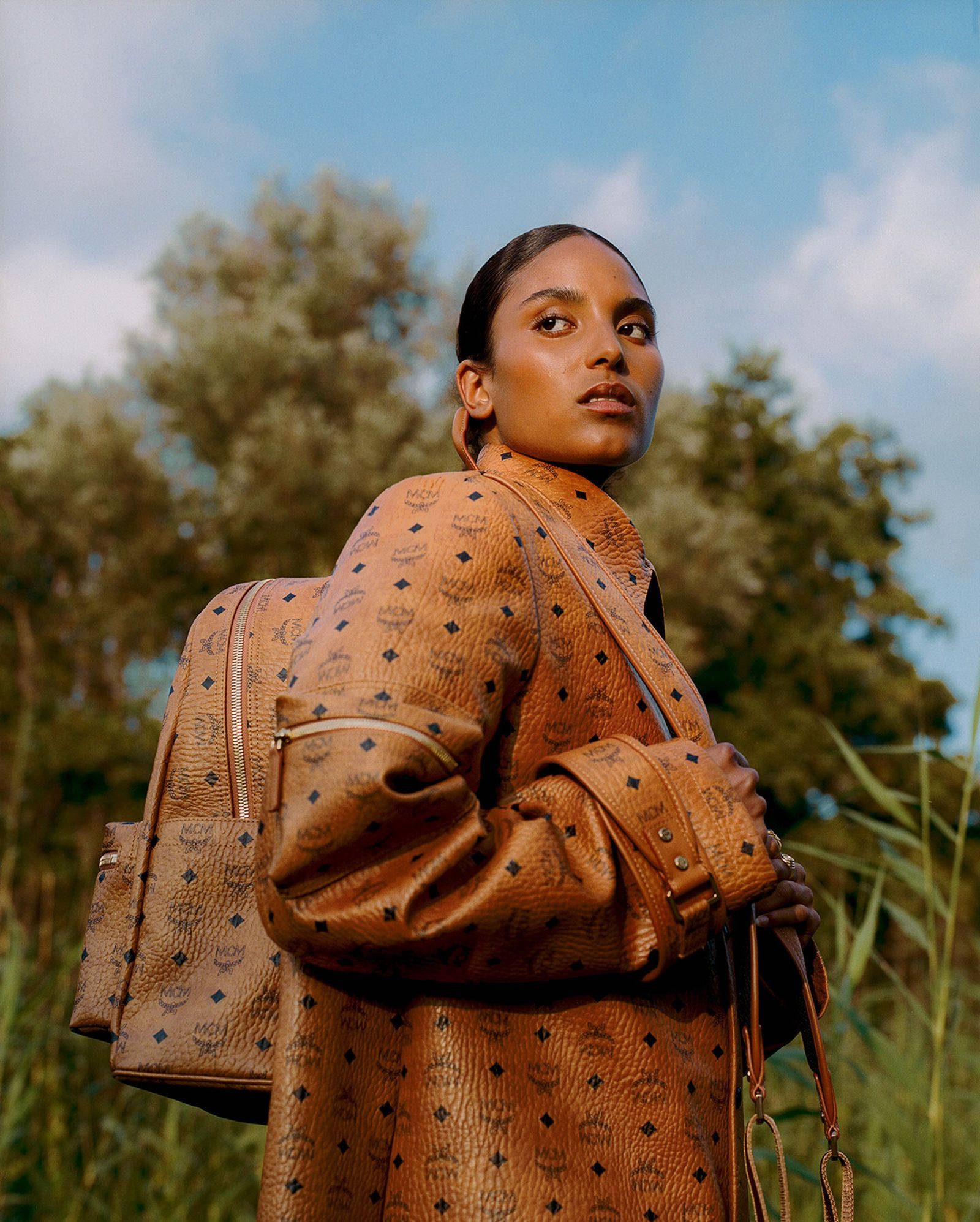 MCM, tan patterned leather outfit, matching backpack, Full HD Phone Wallpaper