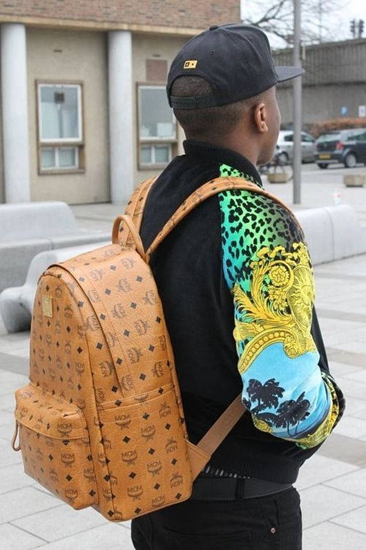 MCM, tan monogrammed backpack, black cap, SD Phone Wallpaper