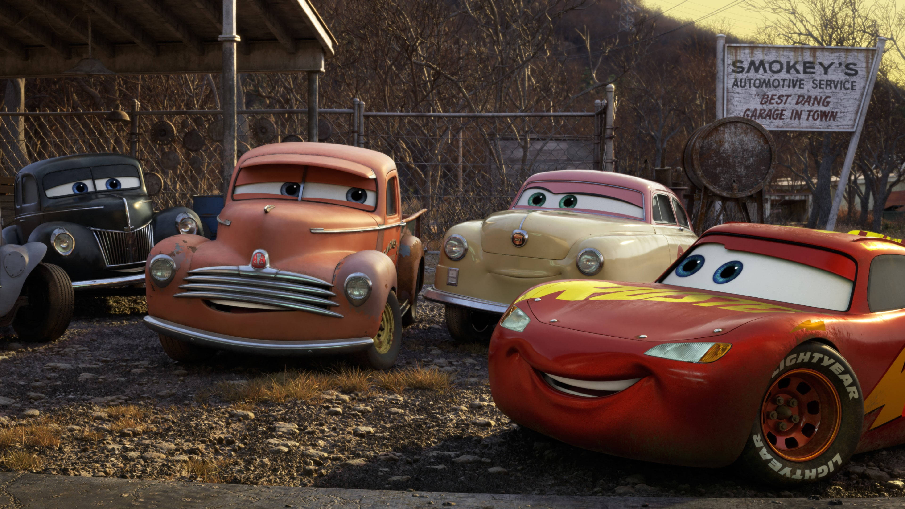 Lightning McQueen, dusty junkyard, golden light, 4K Desktop Wallpaper