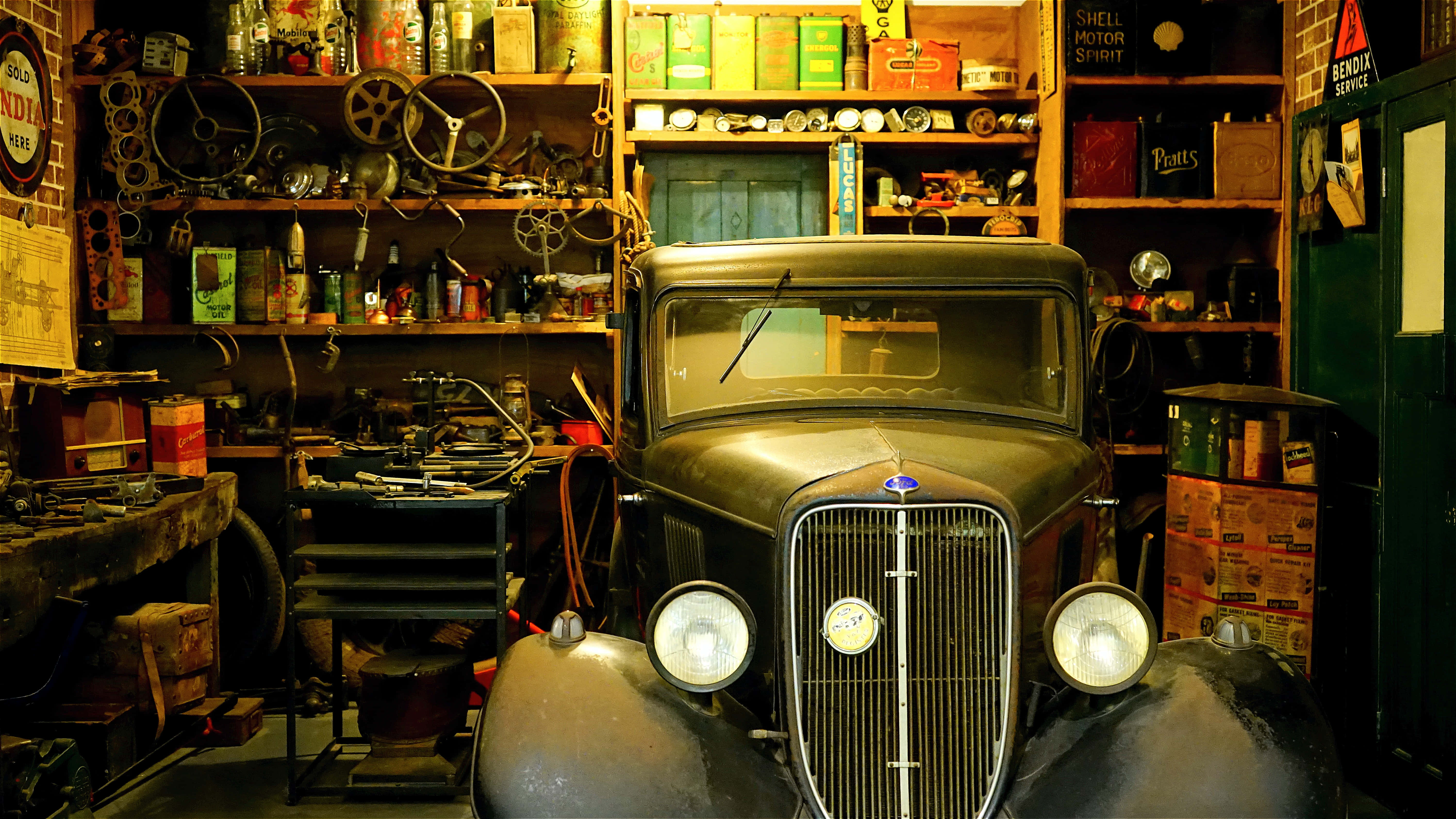 vintage car, warm light, cluttered garage, 5K Desktop Wallpaper