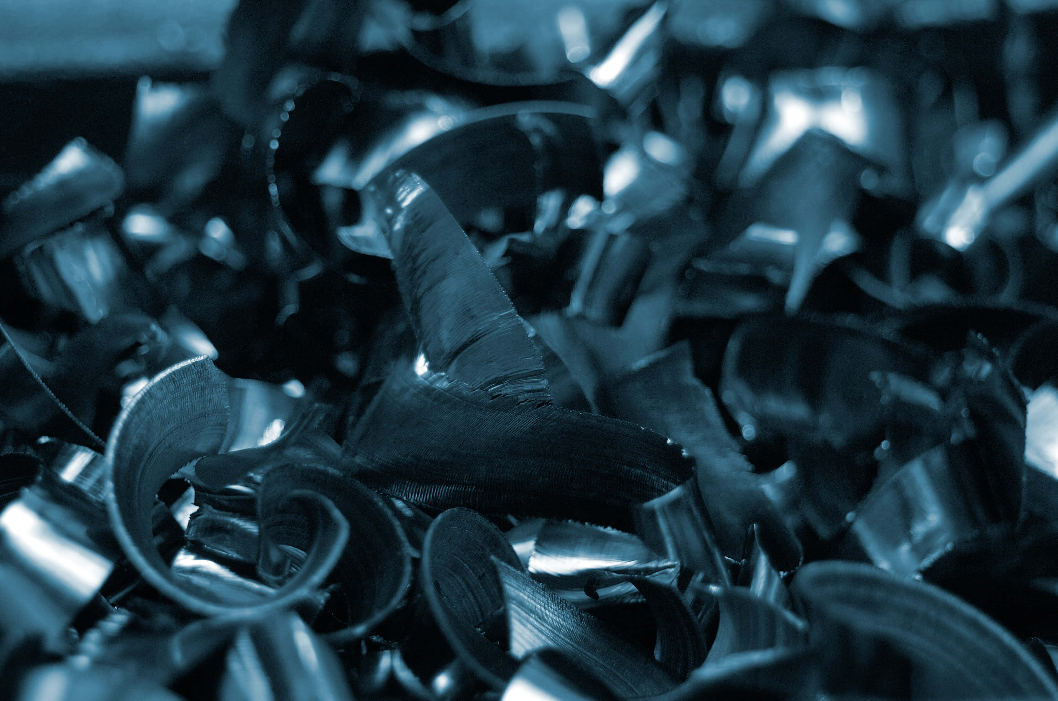 metallic blue-tinted, metal shavings, sharp edges, 2K Desktop Wallpaper