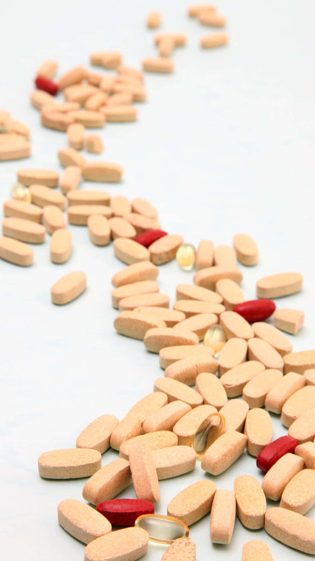 beige pills, red capsules, clean white surface, Full HD Phone Wallpaper