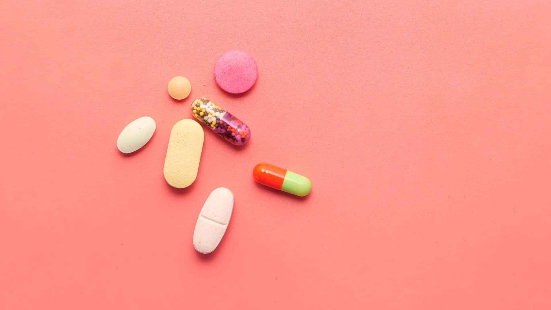assorted medications, pink background, coral background, Full HD Desktop Wallpaper