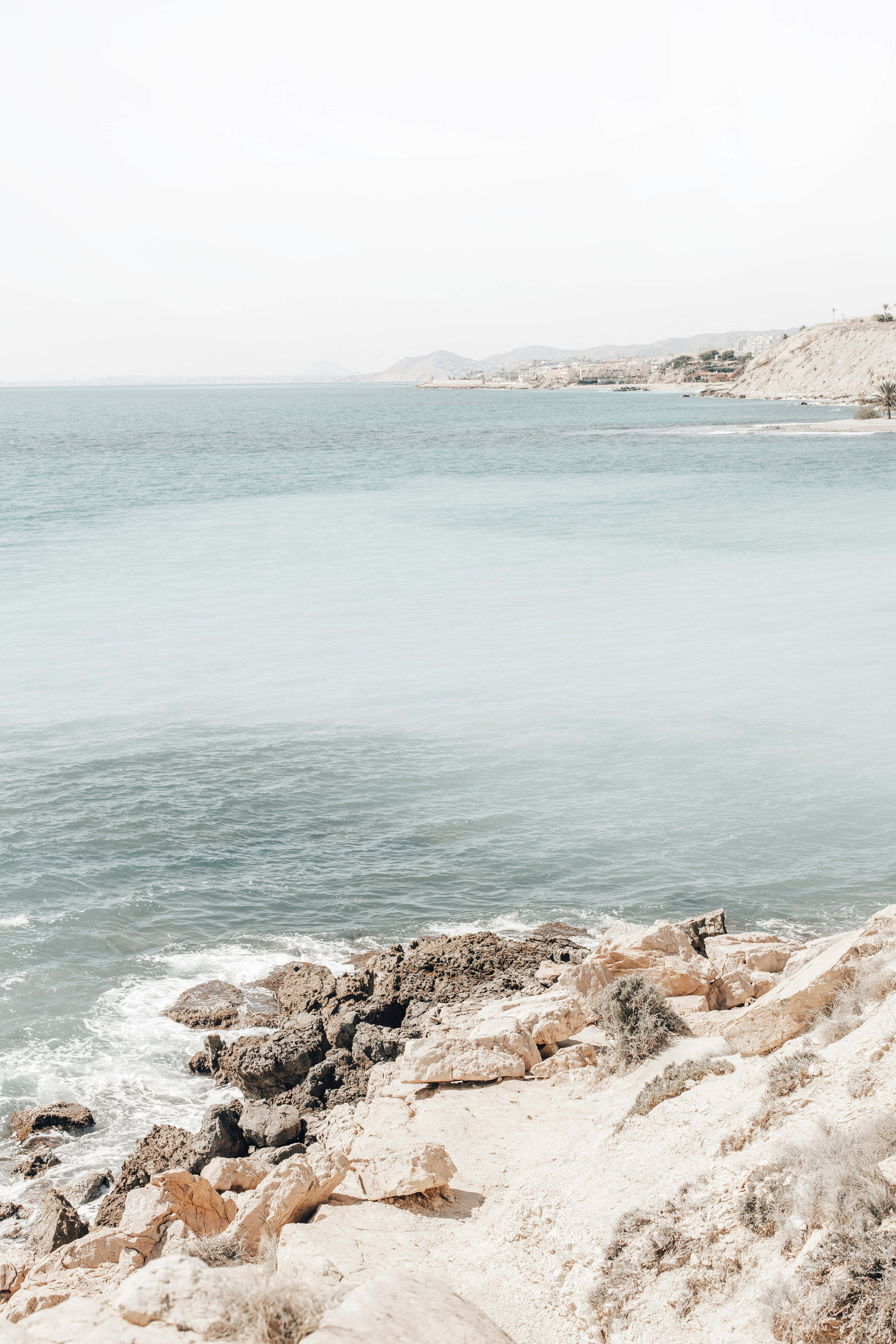 Mediterranean Beach, turquoise waters, rocky shores, 5K Phone Wallpaper