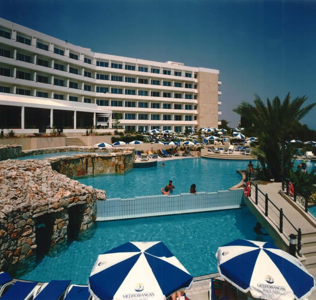 Mediterranean Beach, white hotel, vibrant blue pool, SD Desktop Wallpaper