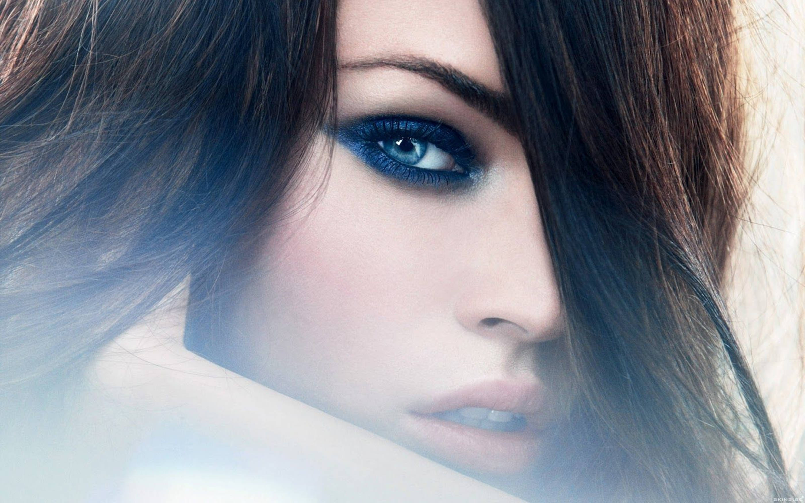 Megan Fox, intense blue eyes, dark hair, 2K Desktop Wallpaper