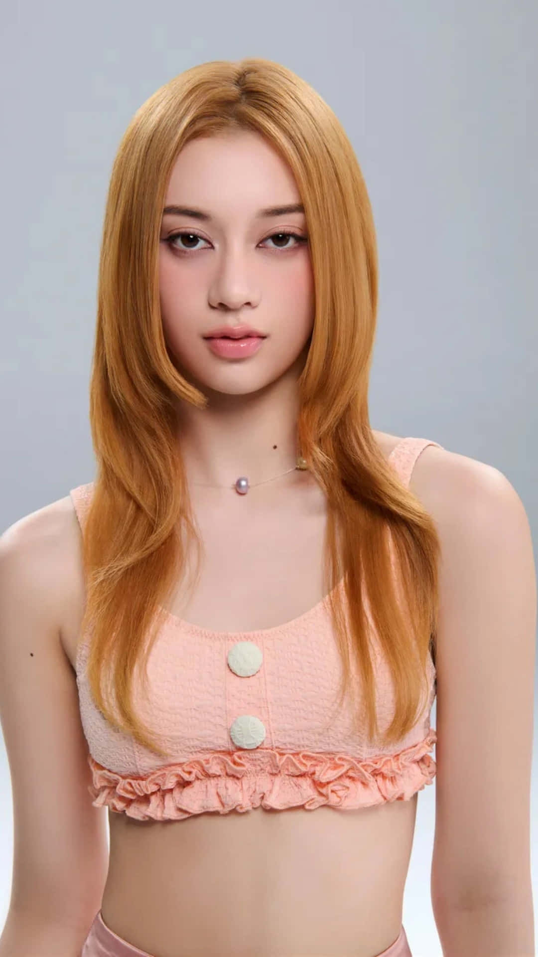 Megan Katseye, honey blonde hair, peach ruffled crop top, Full HD Phone Wallpaper